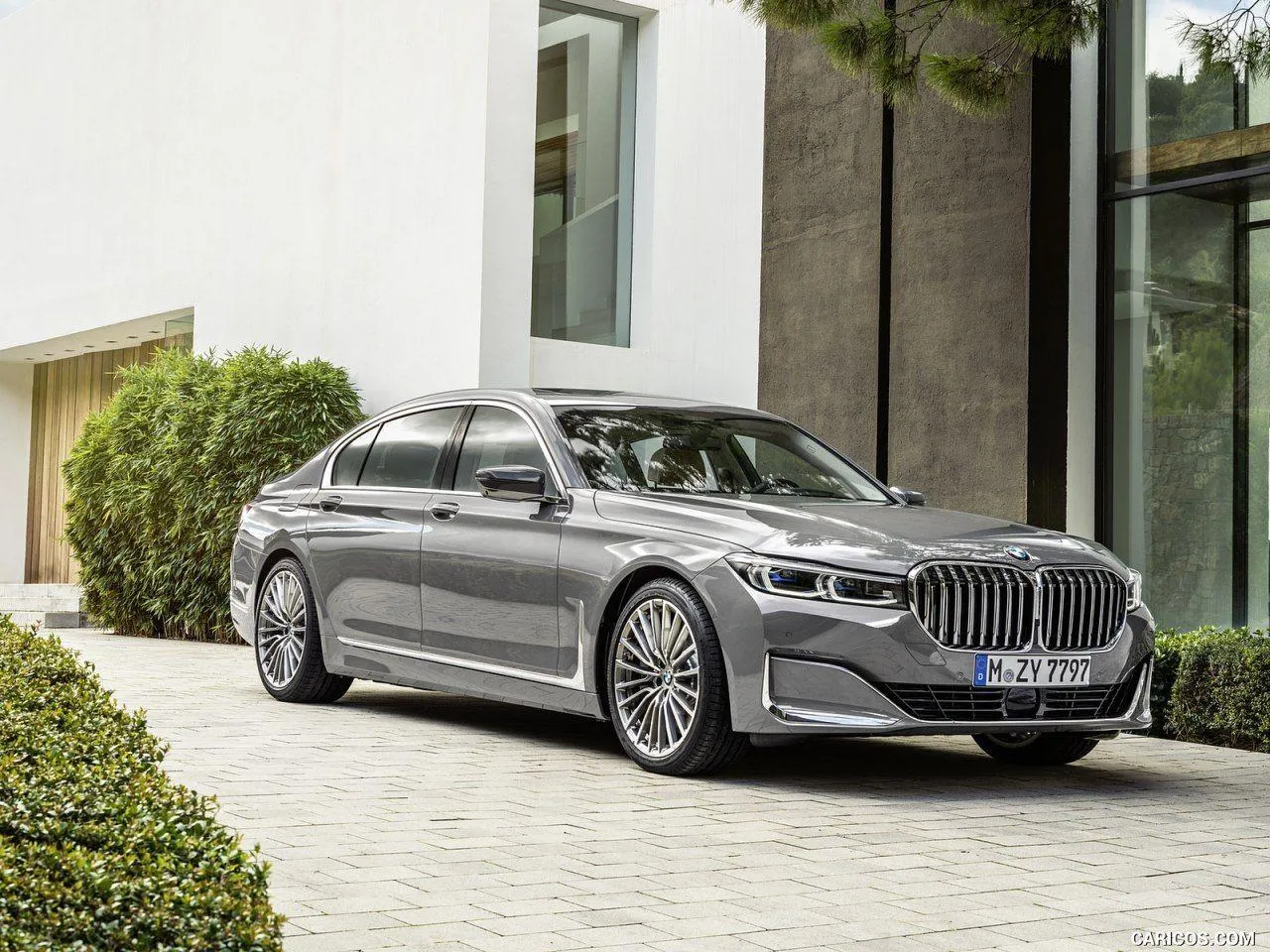 Silver Bmw Sedan Outside Modern Luxury Home Wallpaper
