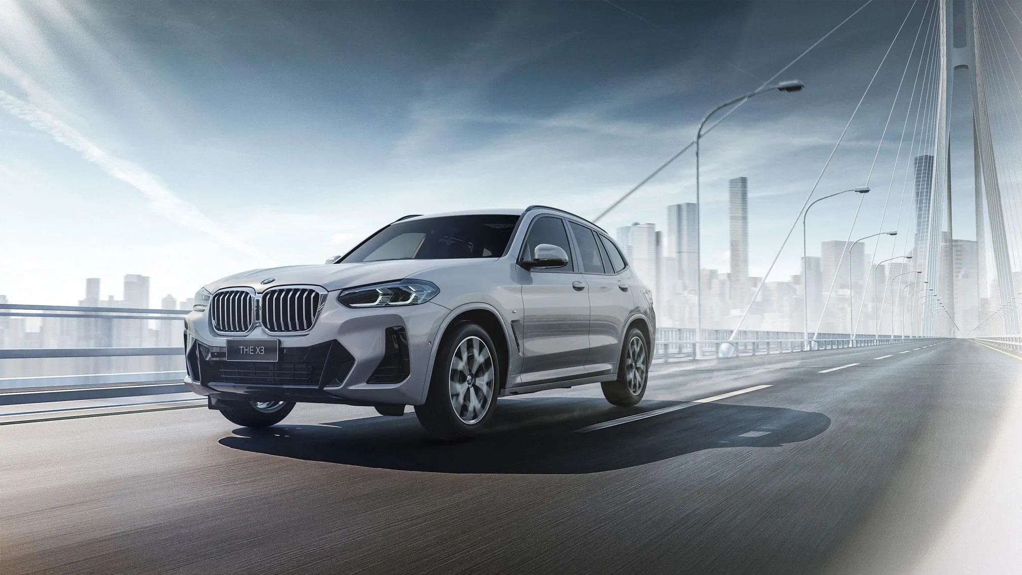 Silver Bmw Suv Driving Fast in a Foggy Urban Scene