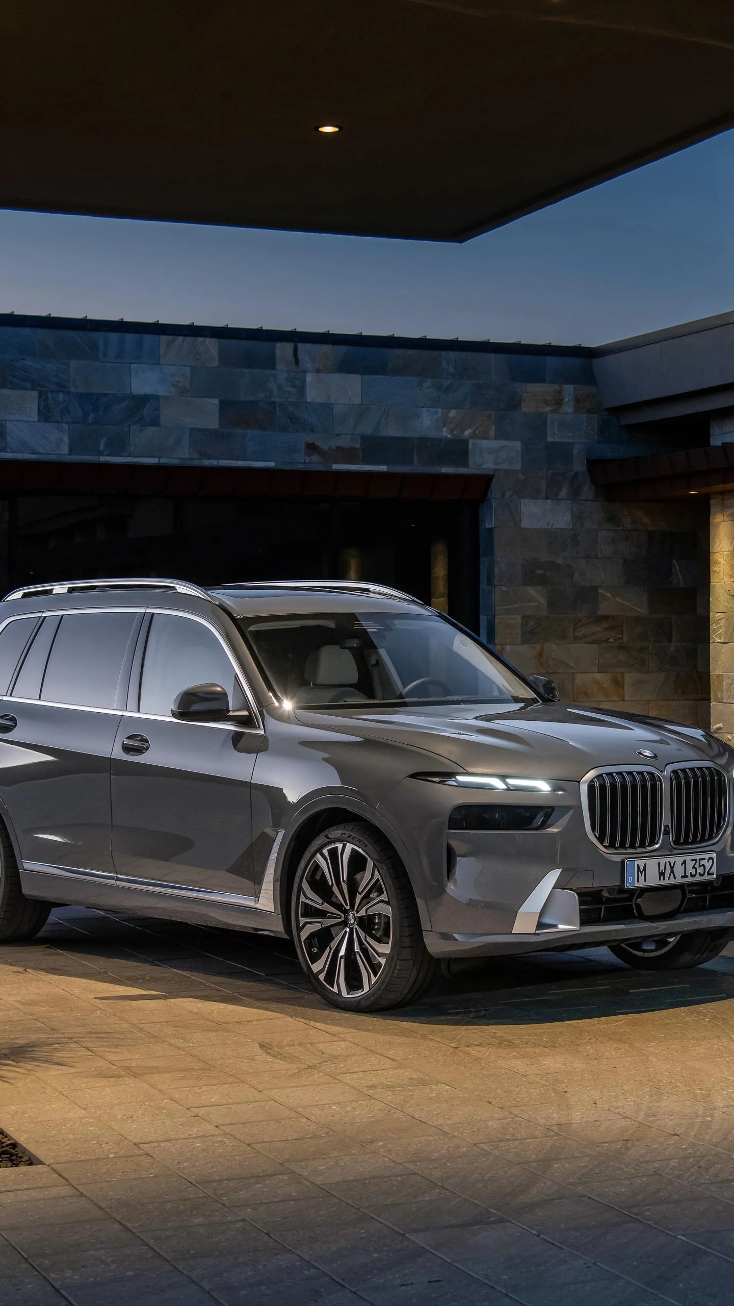 Silver Bmw Suv Parked in Front of a Luxury Home Wallpaper