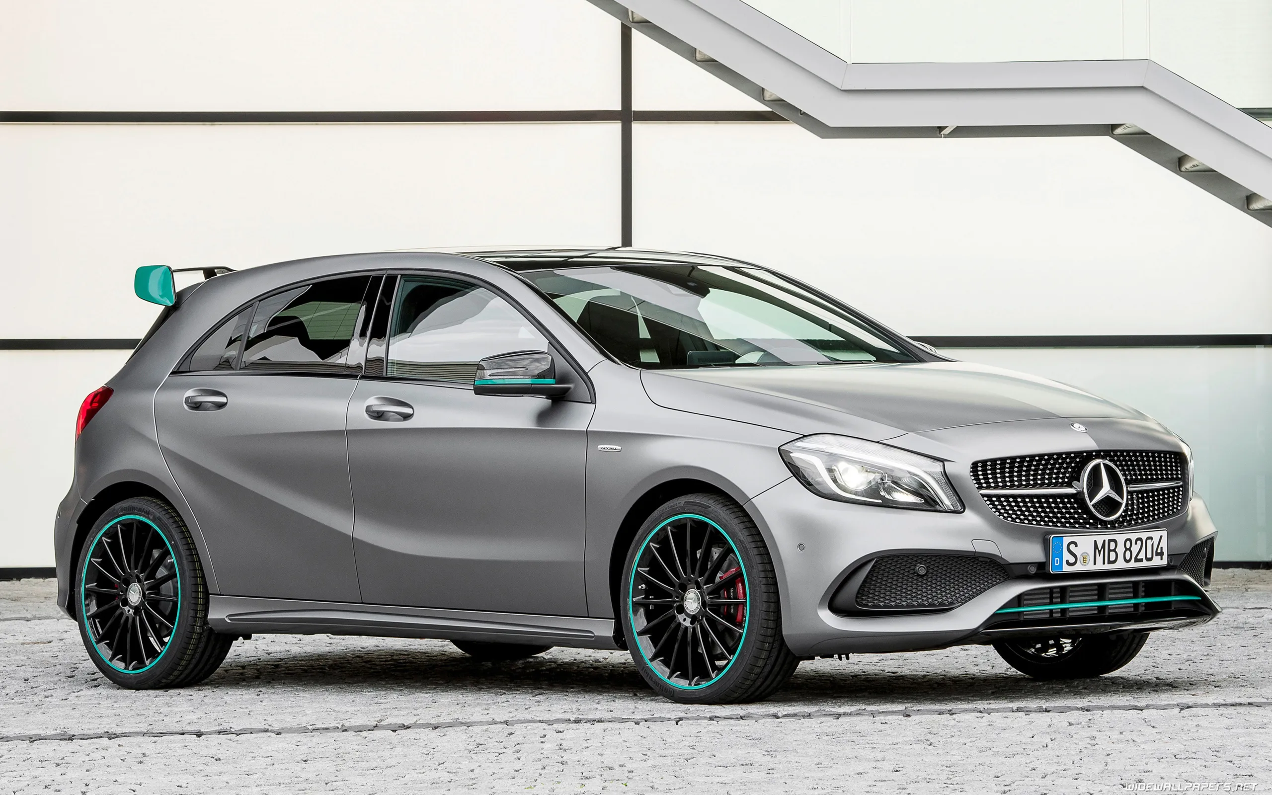 Silver Mercedes Benz Compact Car Parked Near Staircase