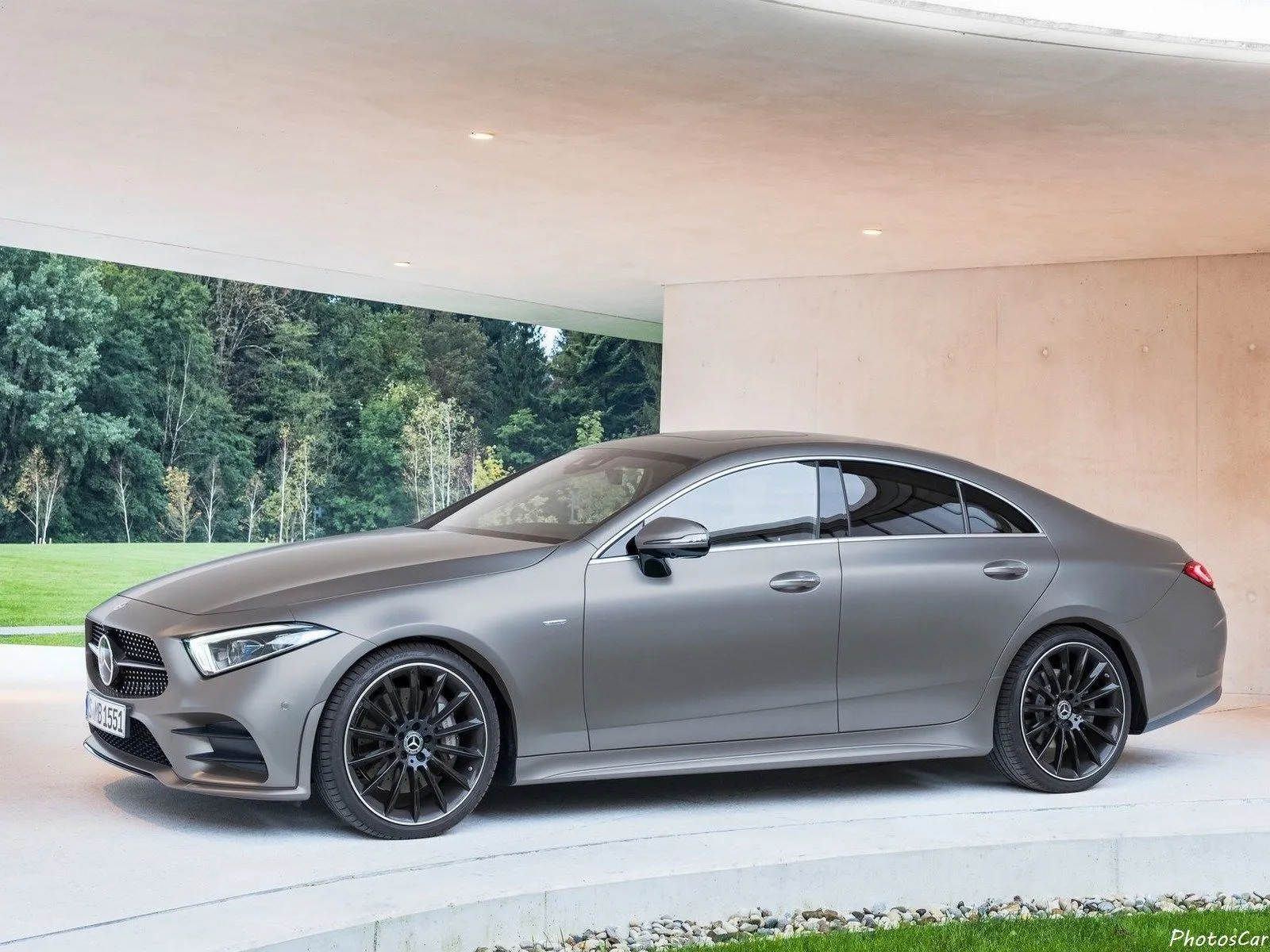 Silver Mercedes Benz Coupe Parked in Modern Setting
