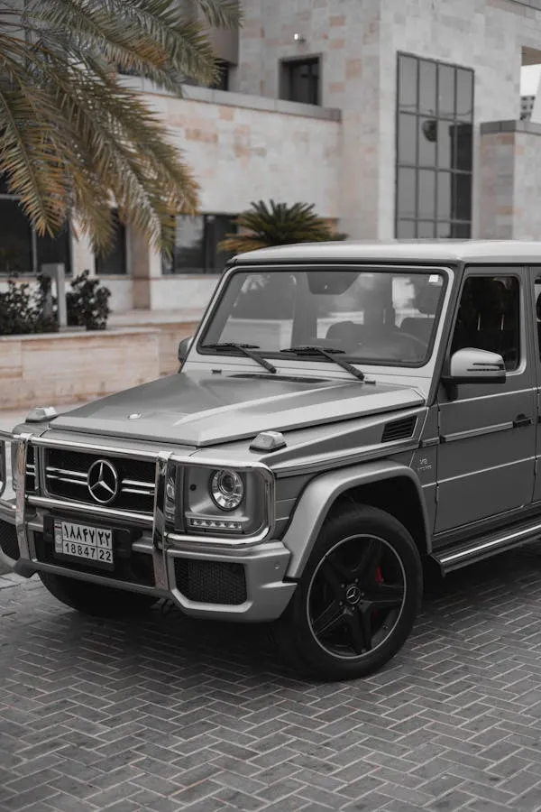 Silver Mercedes Benz G Wagon Parked Near Palm Tree free 4K