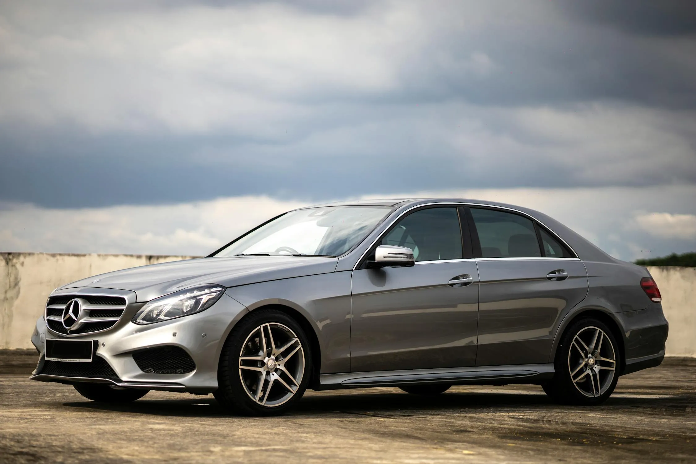 Silver Mercedes Benz Sedan on Countryside Road Wallpaper