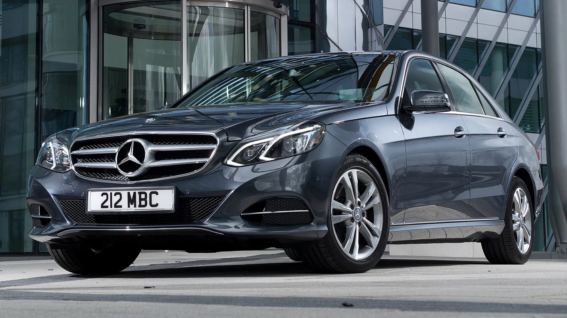 Silver Mercedes Benz Sedan Parked in Urban Setting