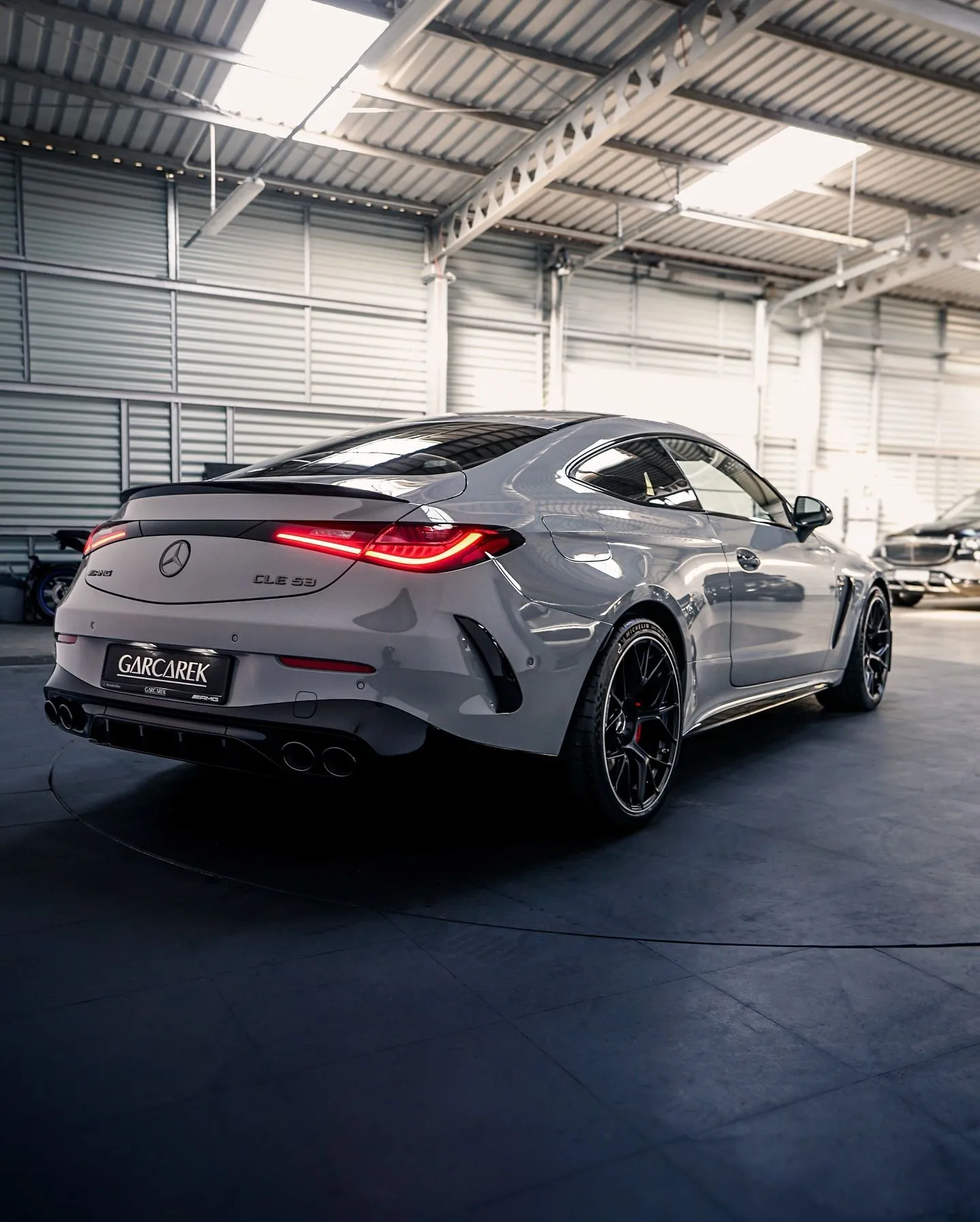 Silver Mercedes Benz Sports Coupe Parked Indoors Wallpaper