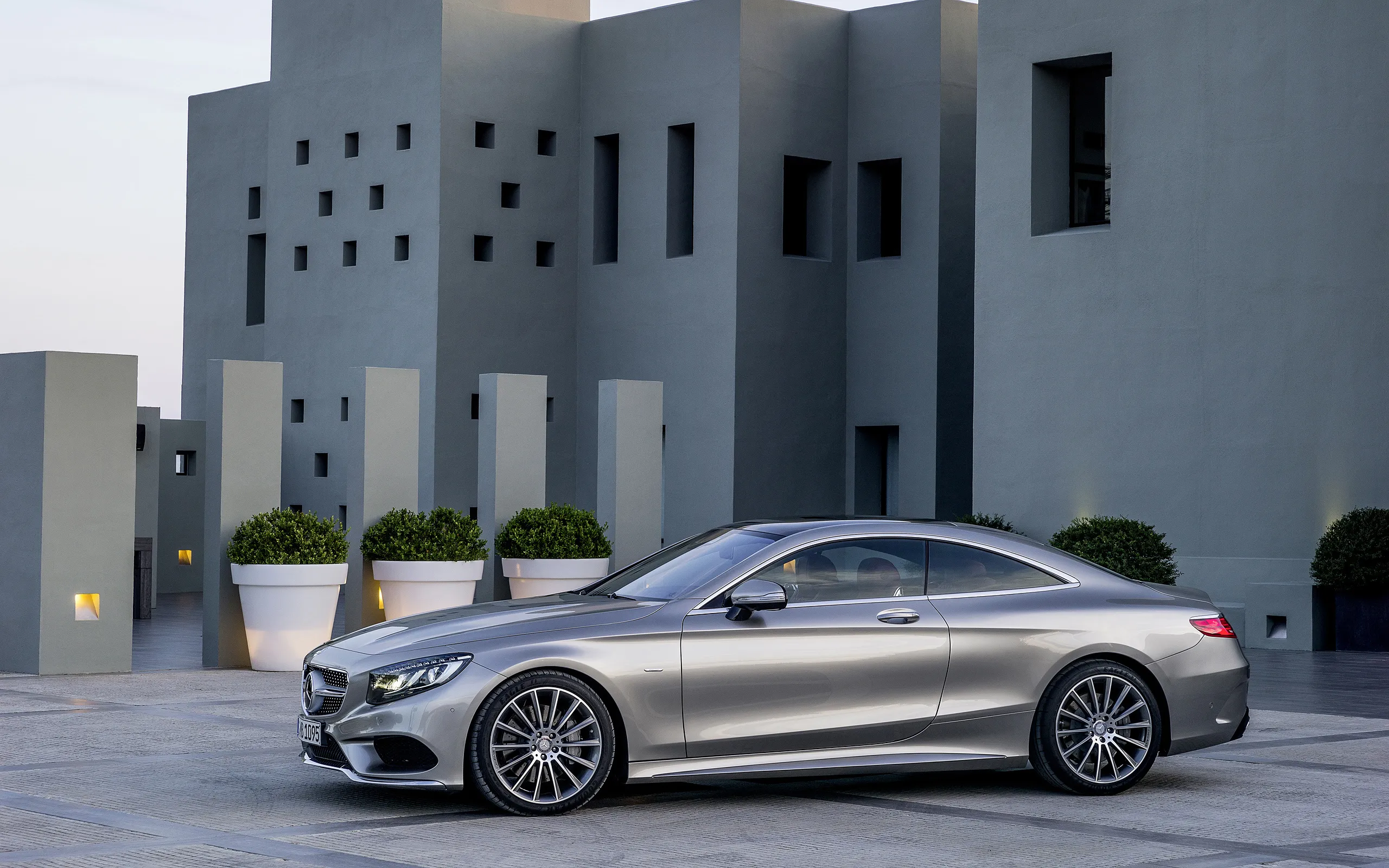 Silver Mercedes Coupe Parked in Modern Urban Setting