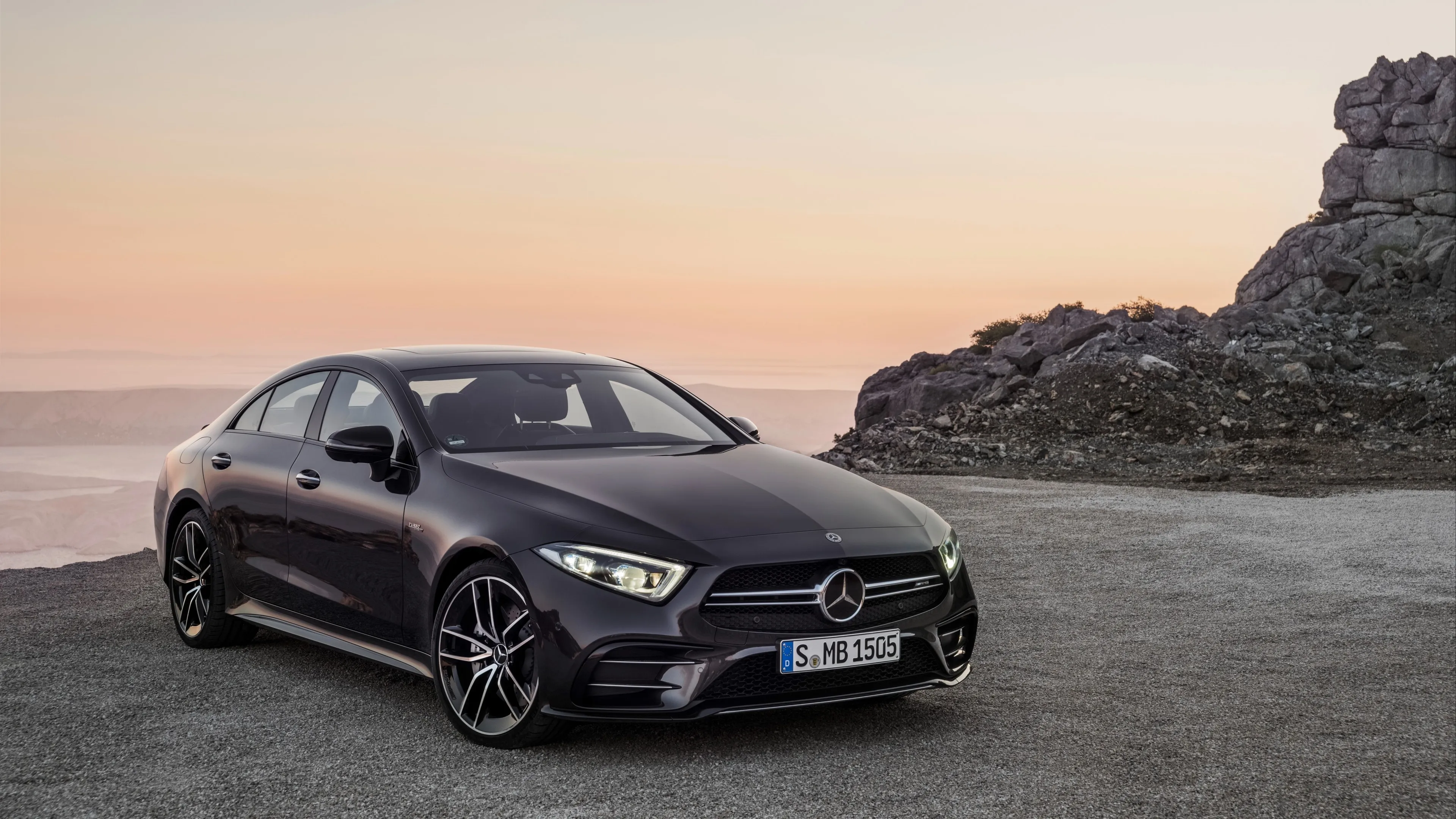 Silver Mercedes Coupe Parked Overlooking Sunset Cliff
