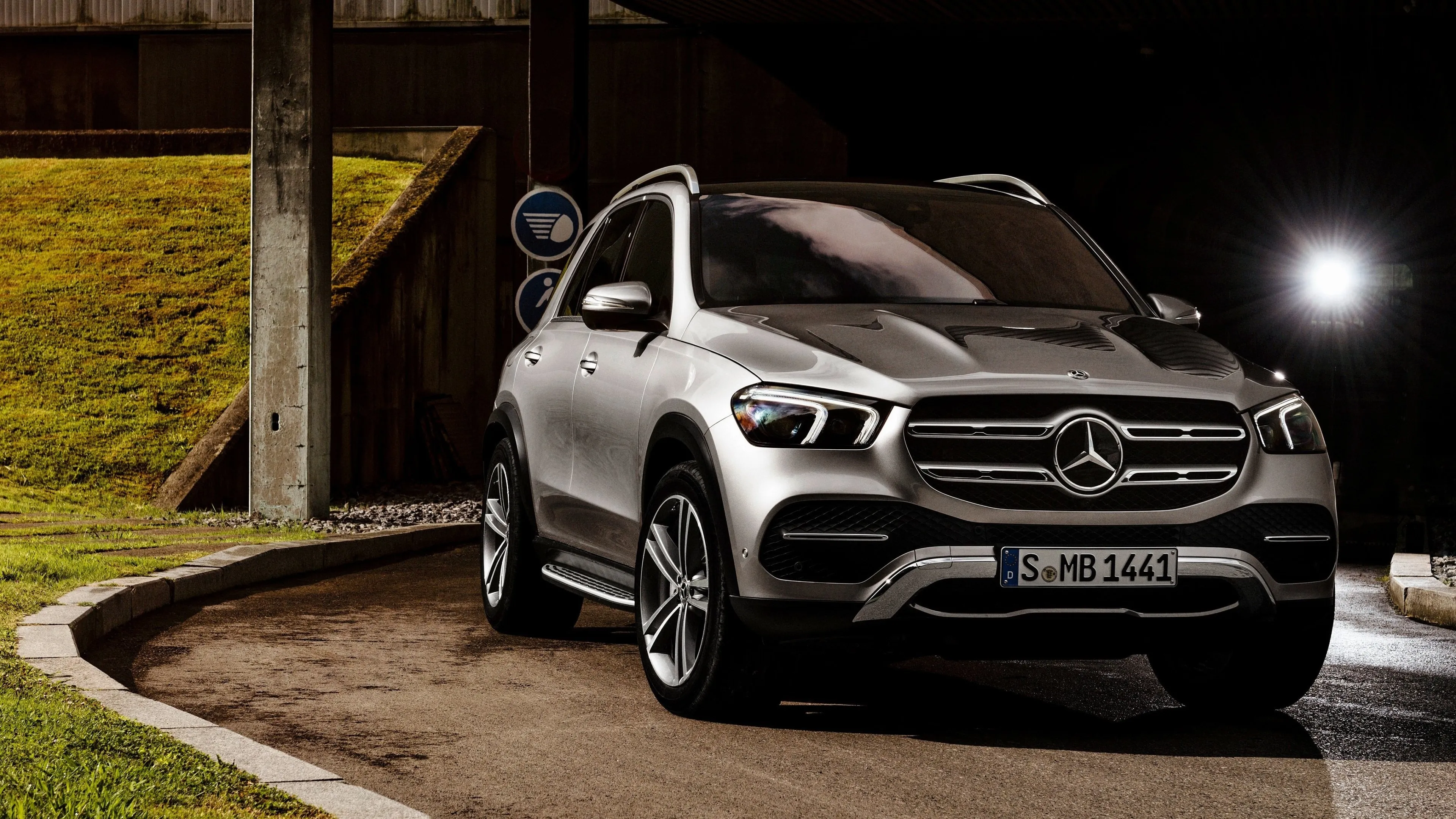 Silver Mercedes SUV Captured Under Street Night Lights