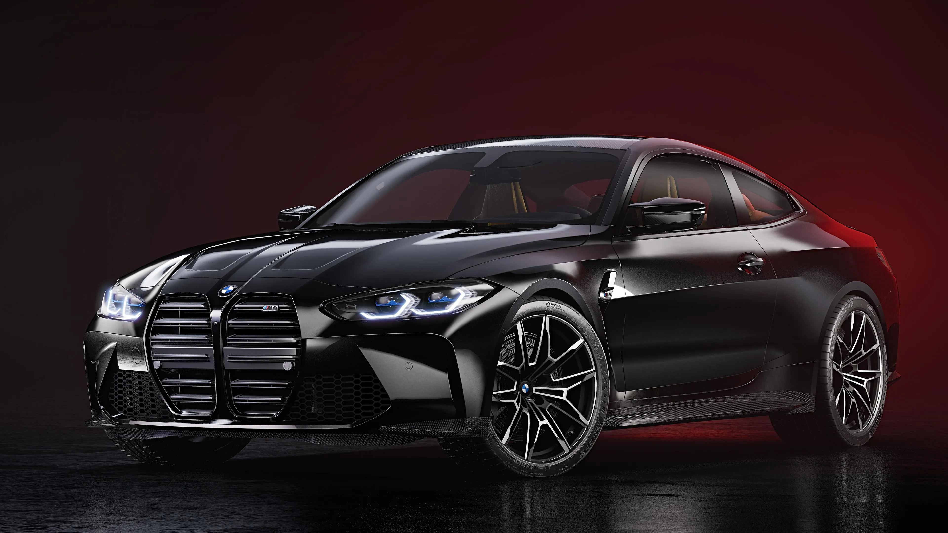 Sleek Black Bmw in Dramatic Red Lighting Studio Setting