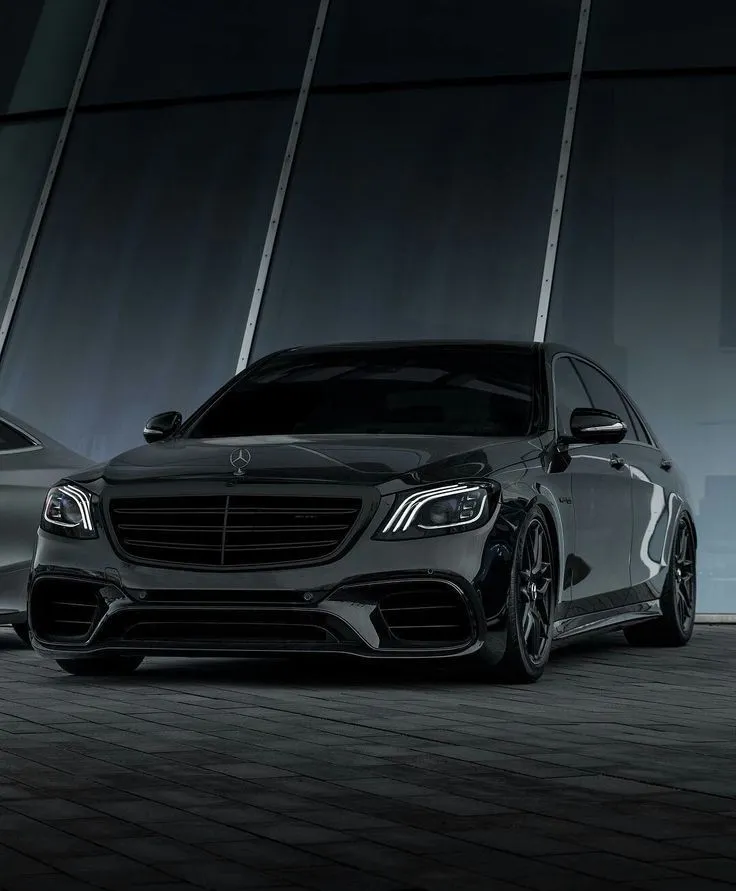 Sleek Black Mercedes in Modern Indoor Showroom Lighting