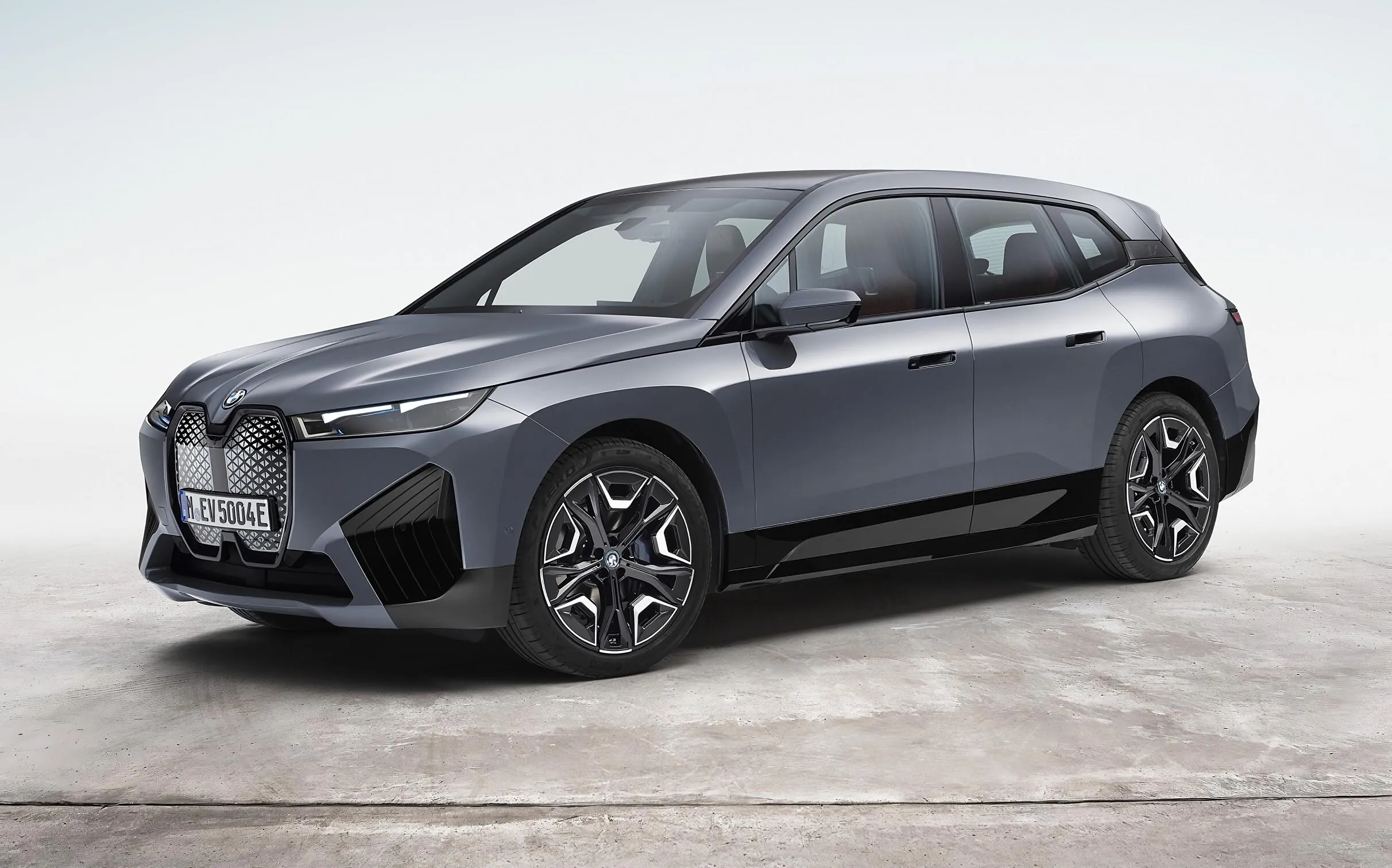 Sleek Gray Bmw Suv Posed in Minimalist Indoor Setting