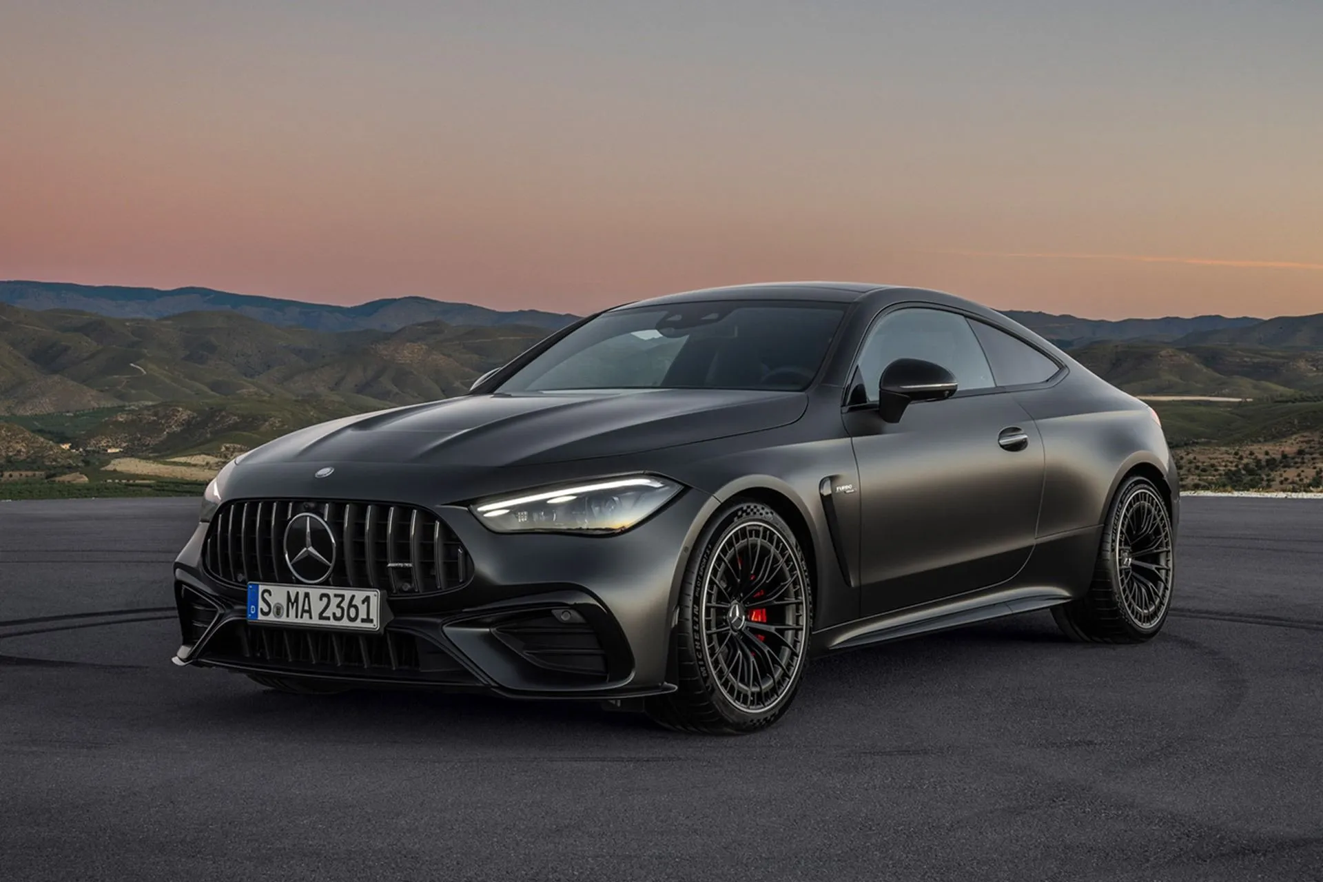 Sleek Mercedes Benz AMG Coupe at Sunset on Highway image