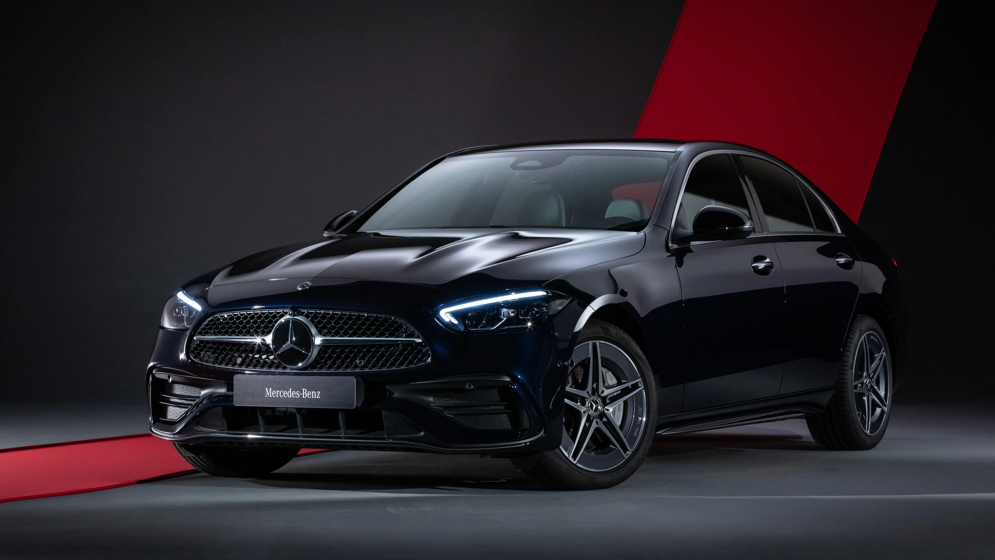 Sleek Mercedes Benz Sedan Showcased in Studio Lighting