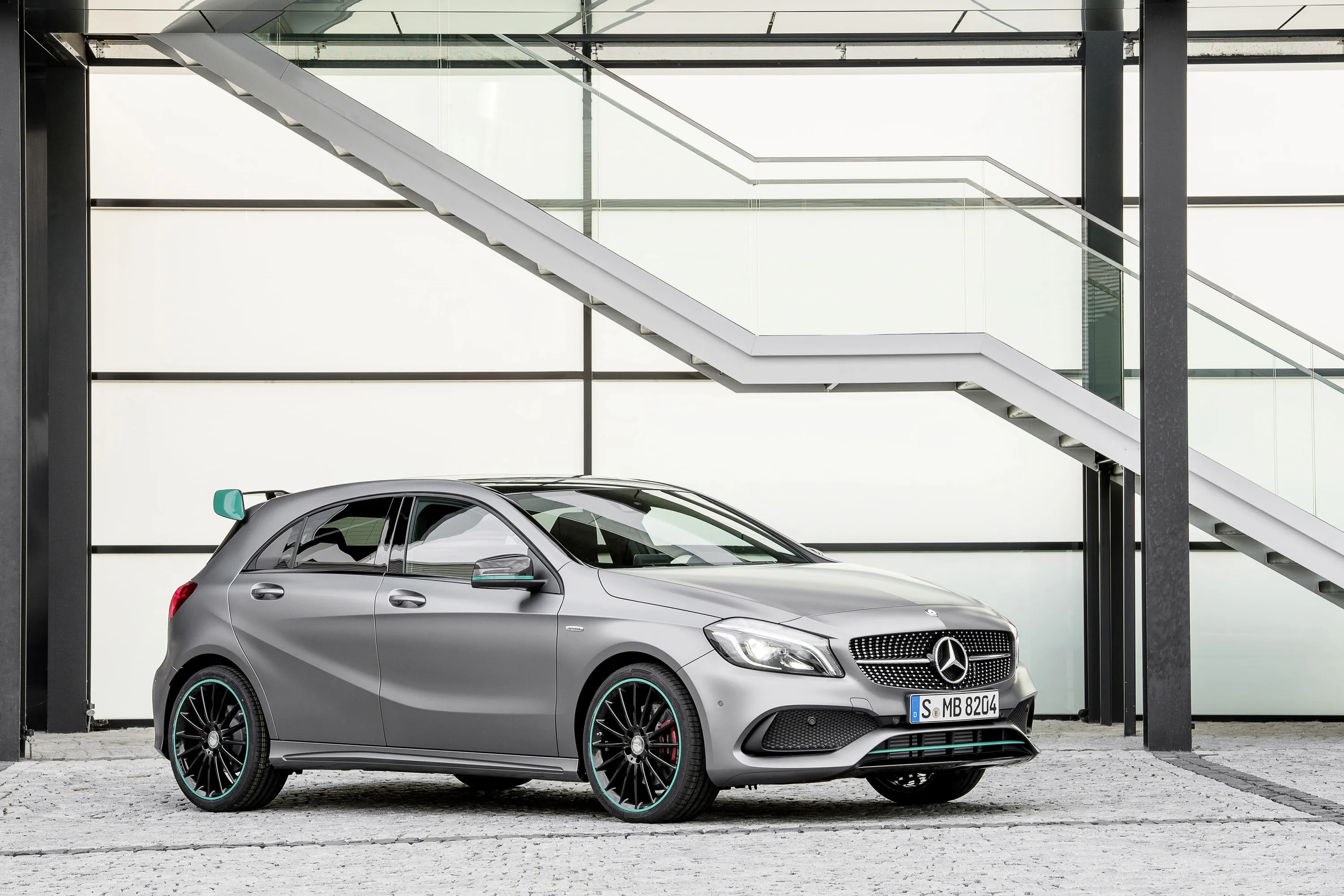Sleek Mercedes Benz SUV Near Modern Building with Glass
