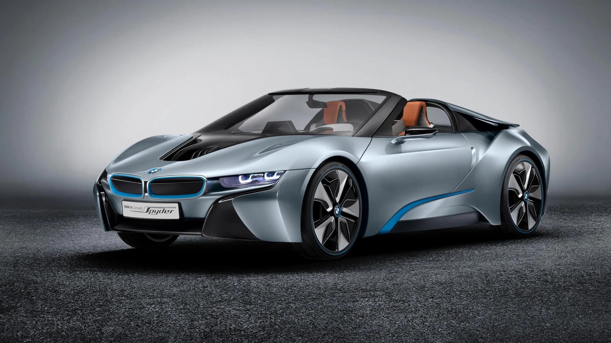 Sleek Silver Bmw Convertible on Gray Background Image