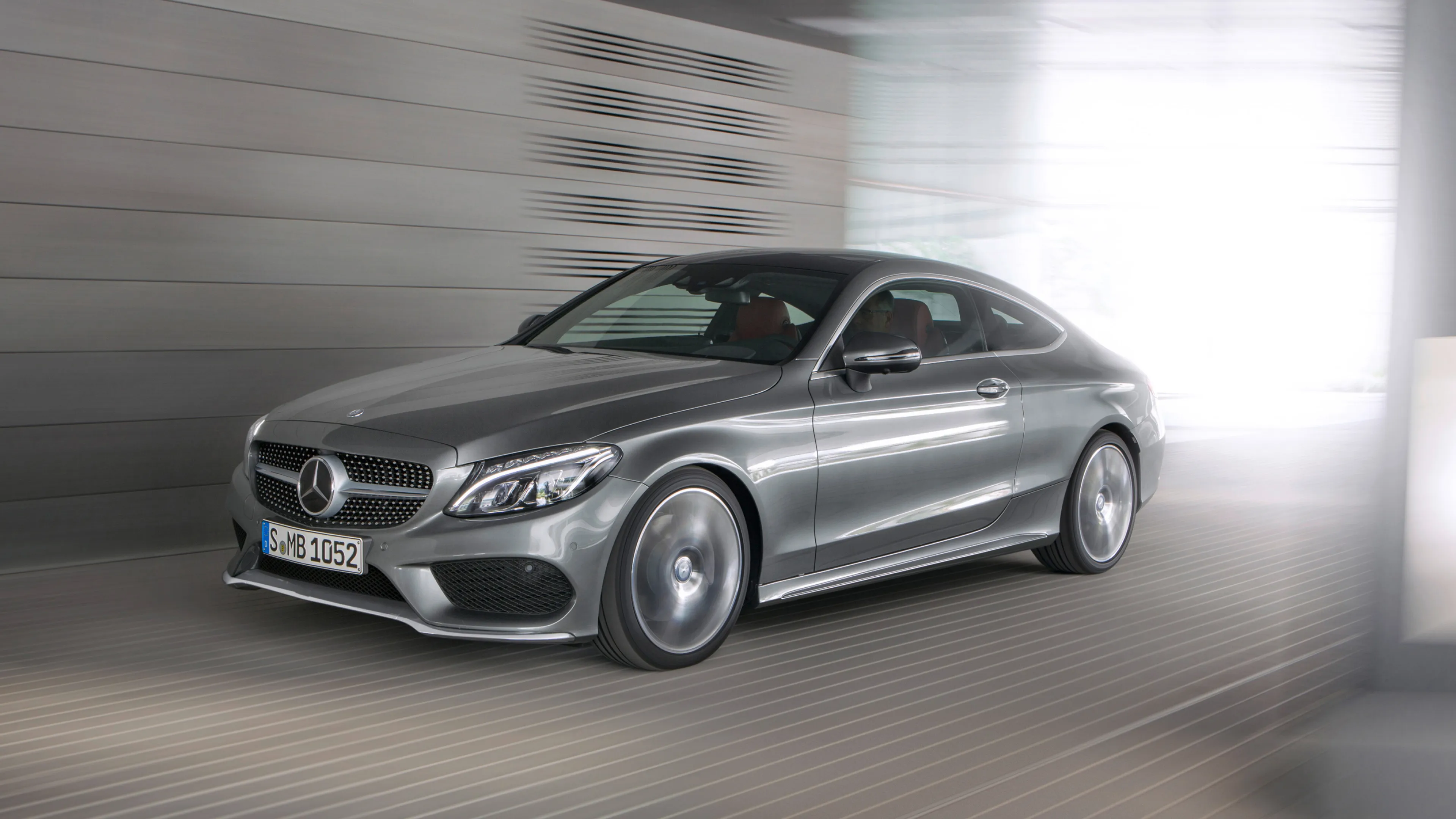 Sleek Silver Mercedes Benz Coupe Speeding in Tunnel image