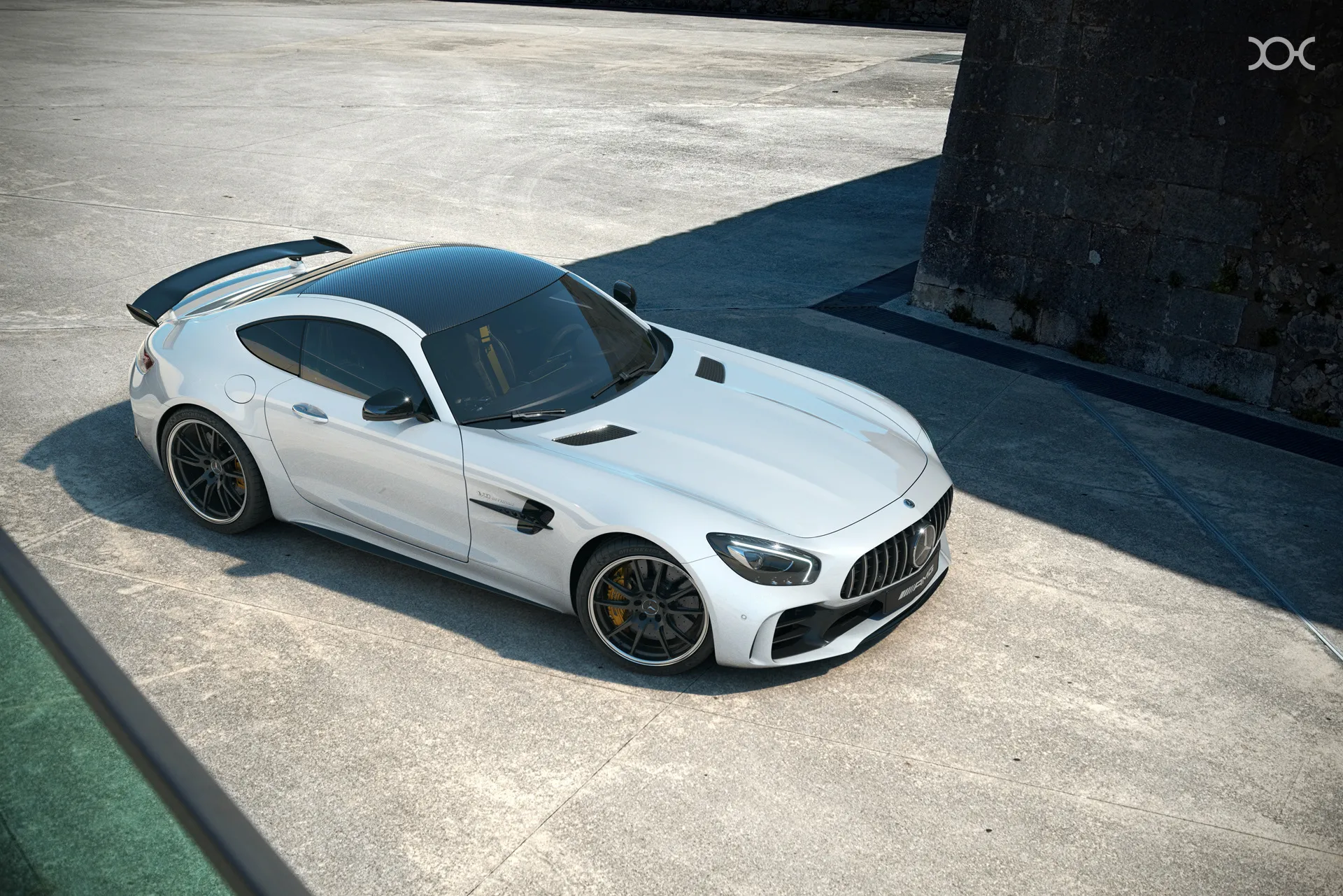 Sleek White Mercedes Benz Coupe Parked on Concrete Wallpaper