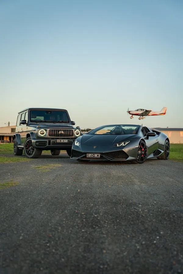 Sports Car and SUV Parked Near Runway with Airplane image