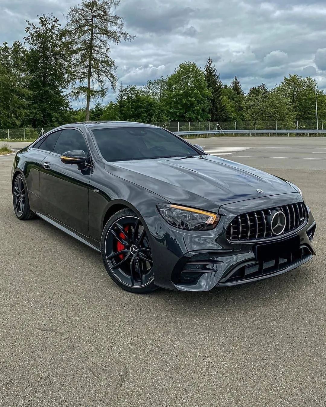 Sporty Grey Mercedes Sedan Parked on Smooth Asphalt image