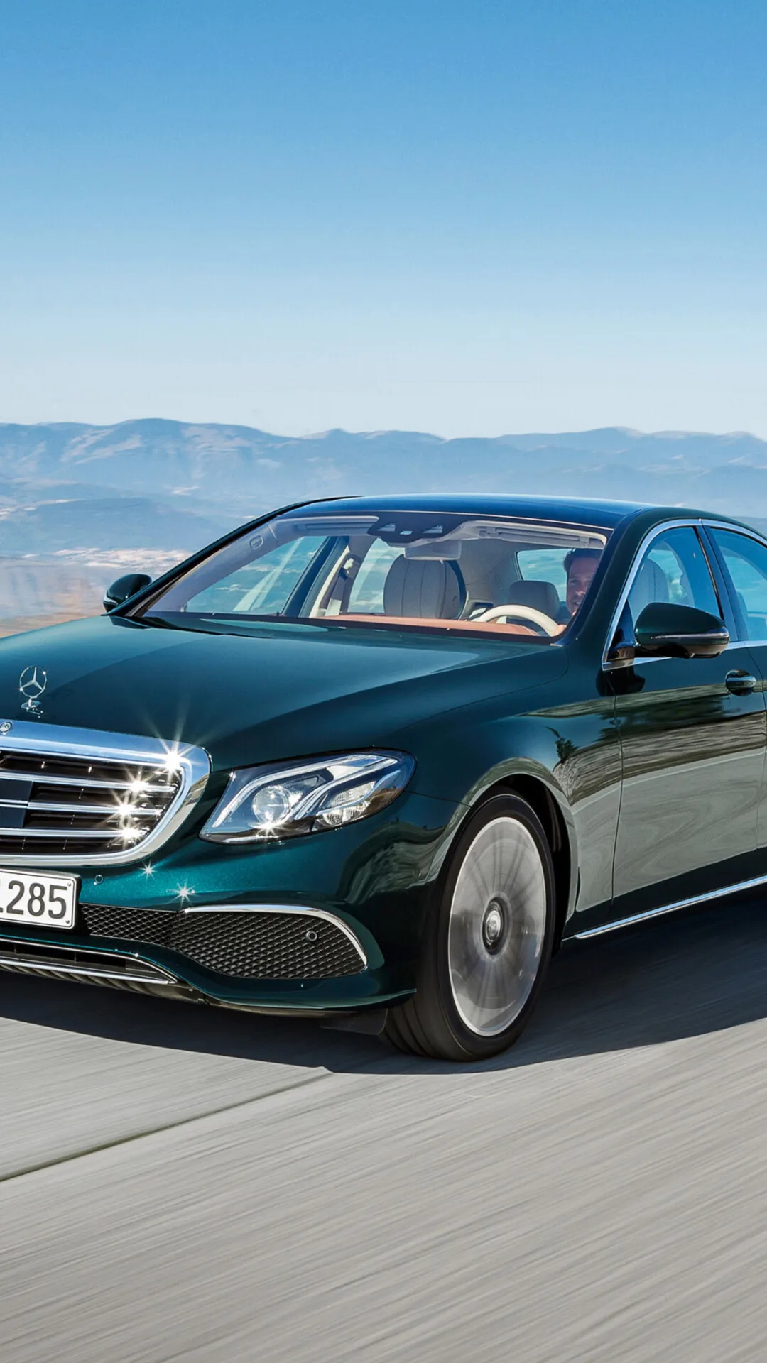 Striking Mercedes Luxury Sedan Driving On Mountain Road 4K
