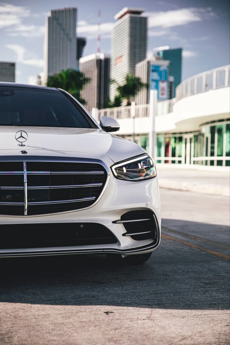Striking White Modern Mercedes SClass on Urban City Road