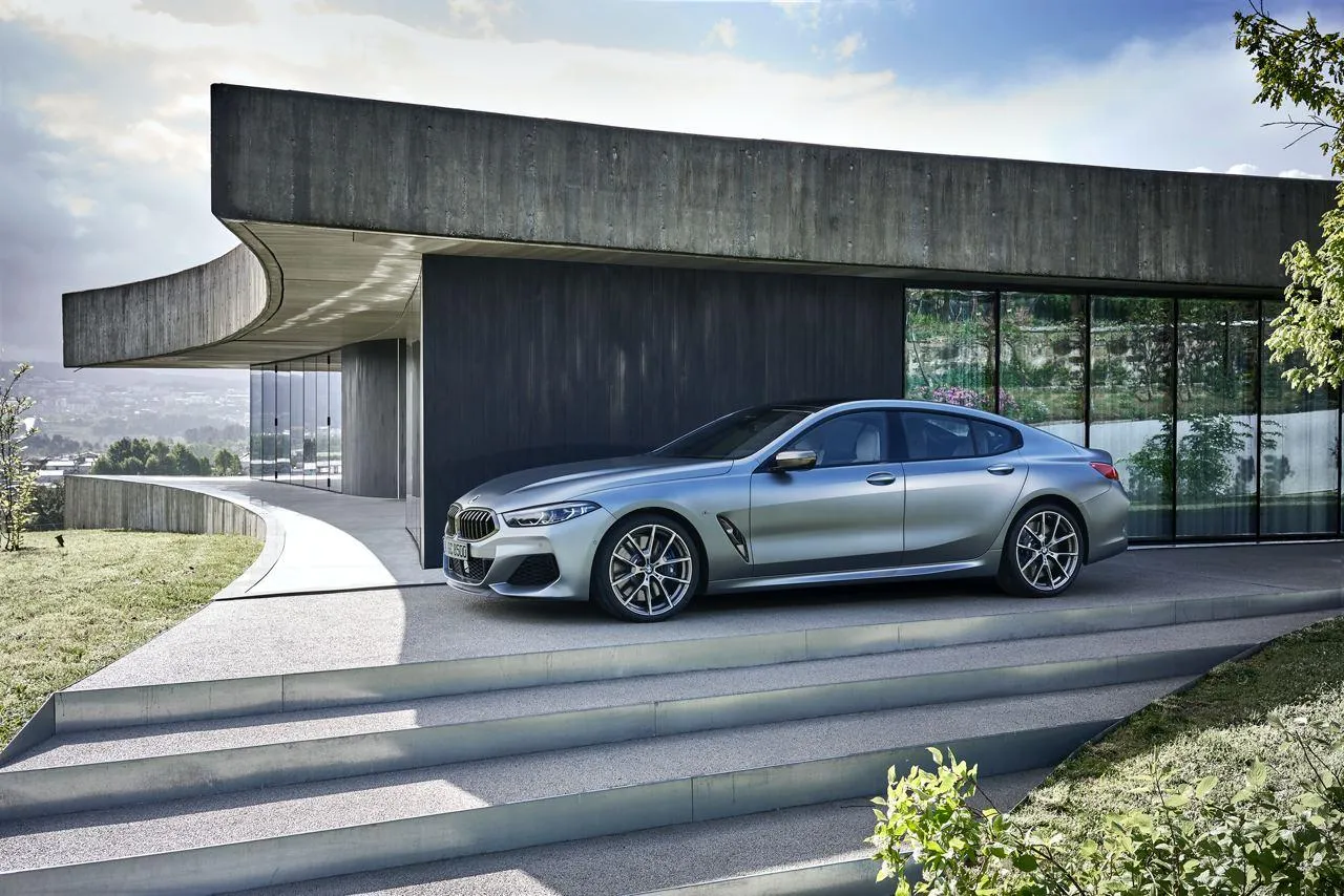 Stunning Modern Bmw Car Parked Beside Concrete House