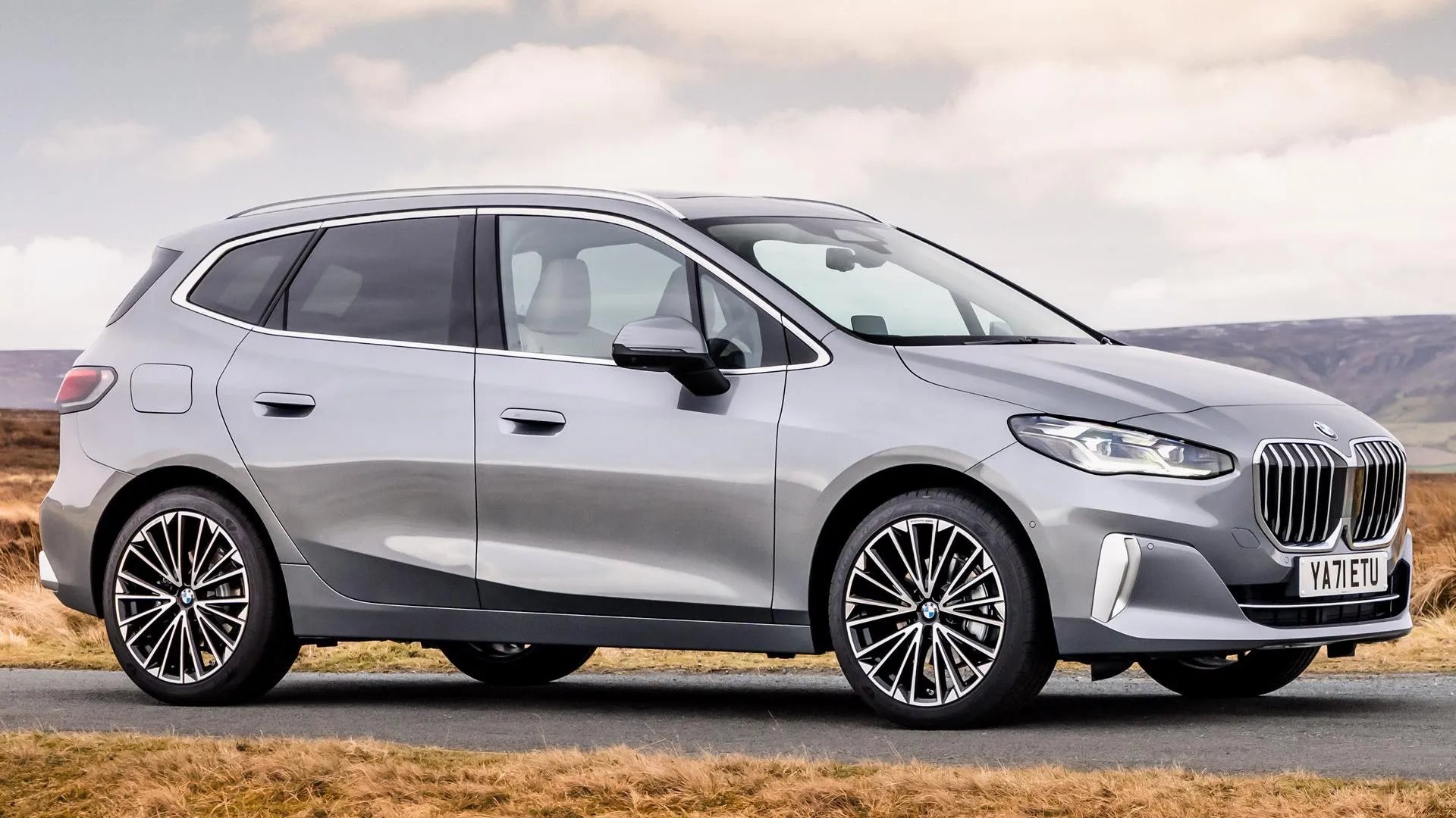 Stunning Sleek Silver Bmw Mpv Parked in Urban Area Hd