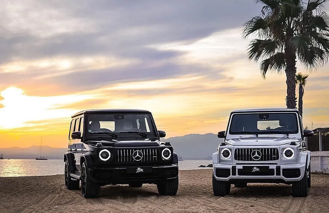 Stunning Two Mercedes G Wagons in Sunset with Palm Trees