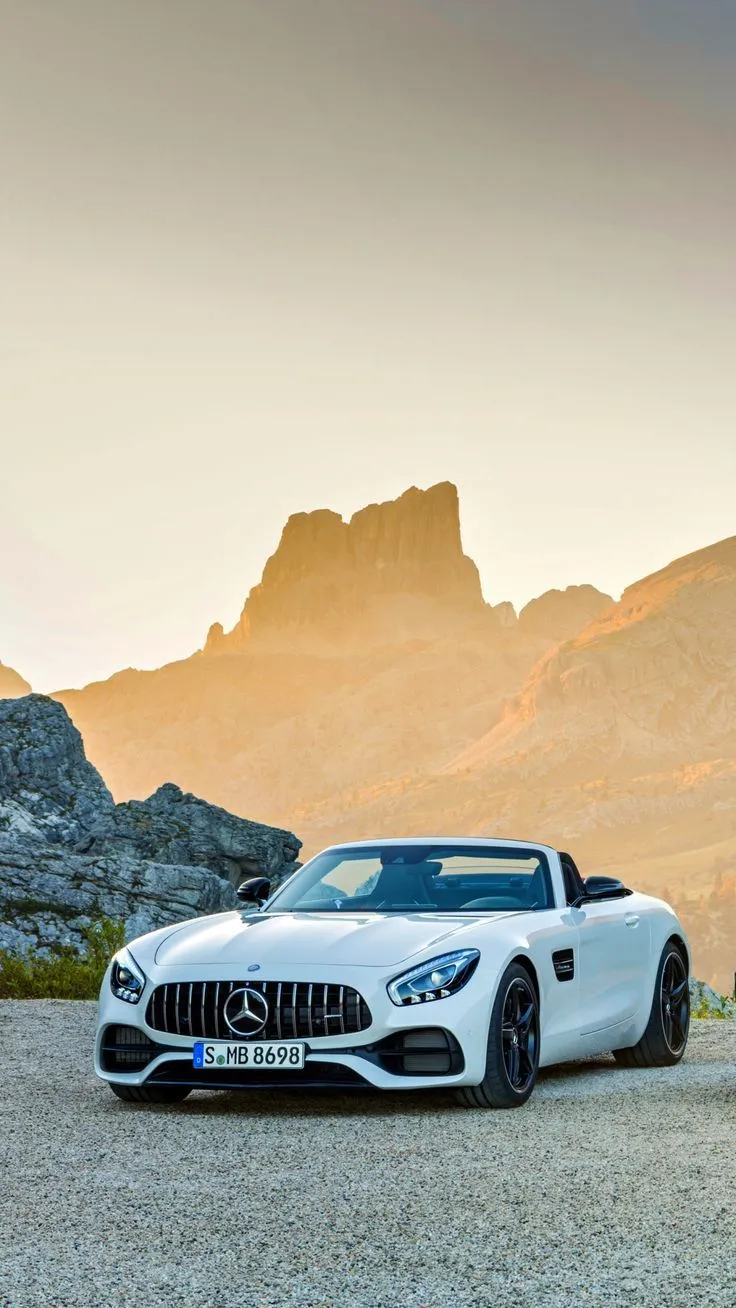 Stunning White Mercedes Sports Car in Scenic Mountain Landscape
