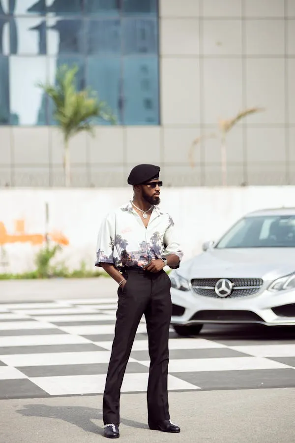 Stylish Man Standing Beside Modern White Mercedes Car