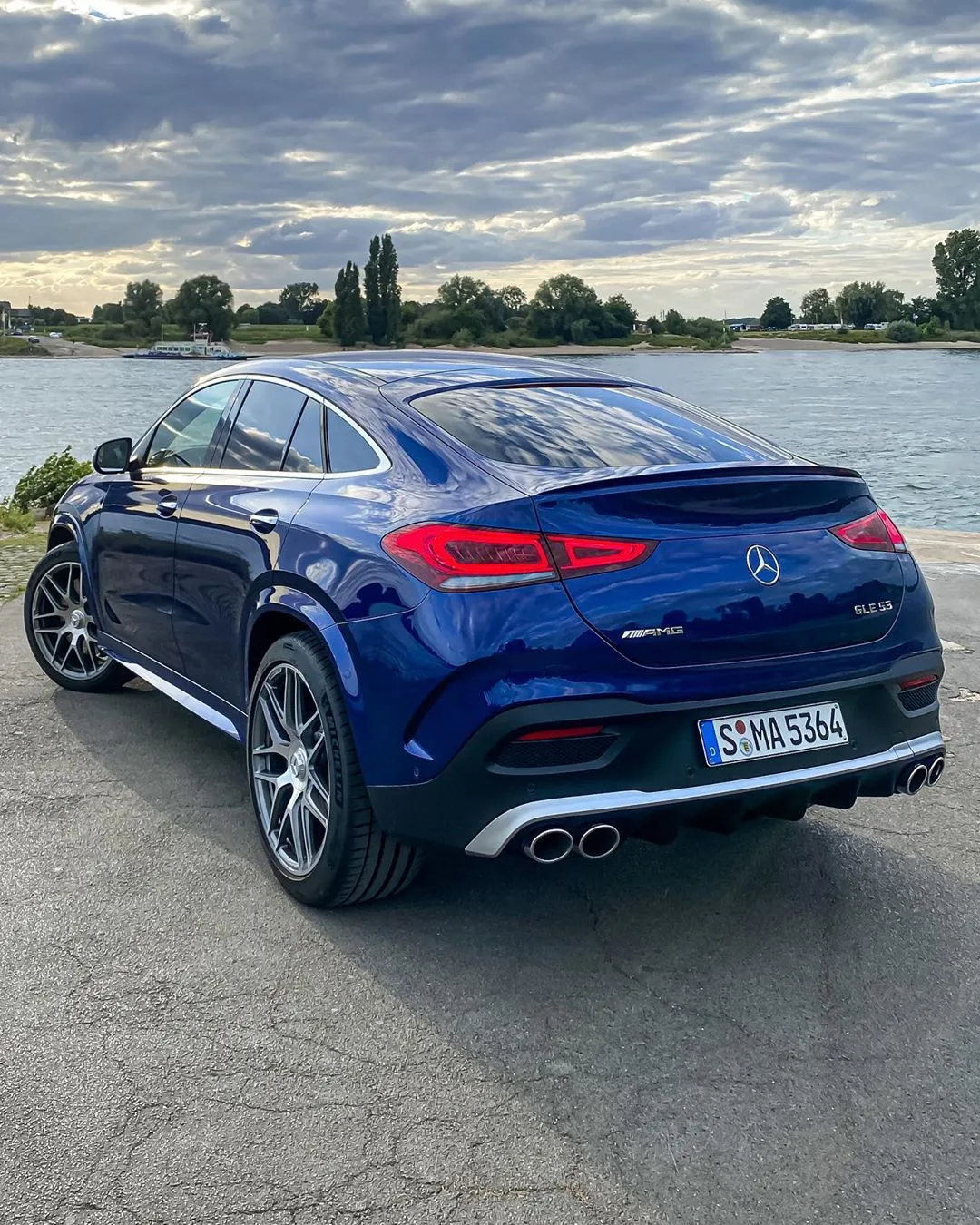 Stylish Mercedes Benz Coupe Parked Near Waterfront image