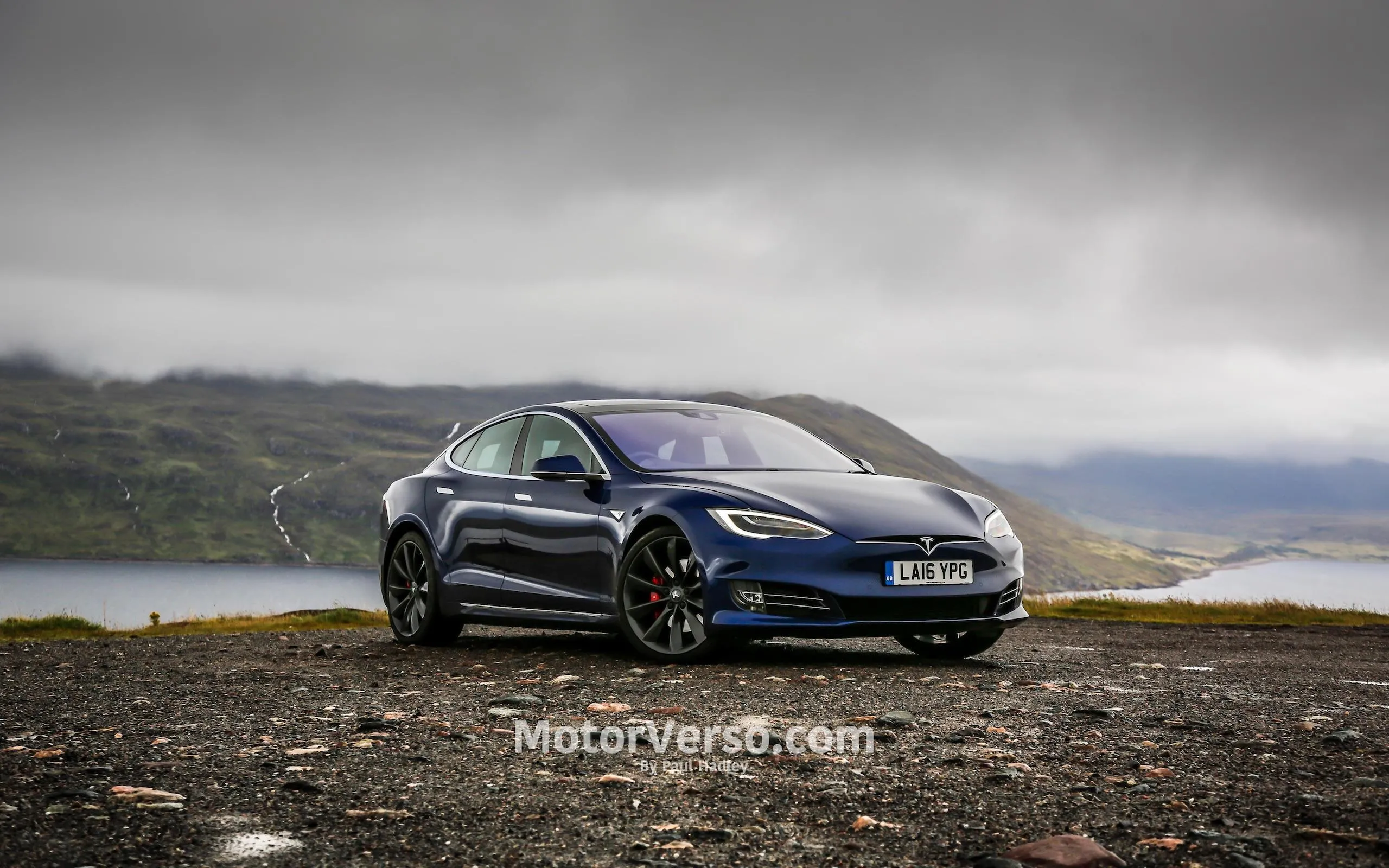 Tesla Model S Black Electric Car on Wet Mountain Road HD