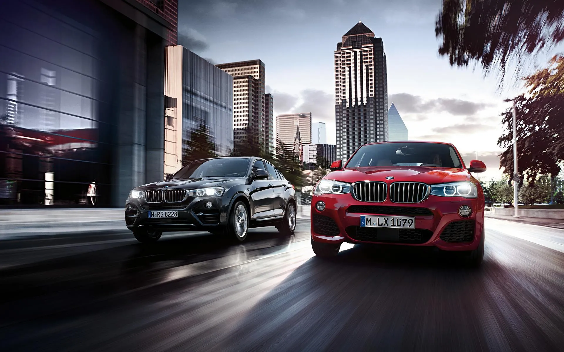 Two Bmw Cars Driving in City with Tall Skyscrapers Hd