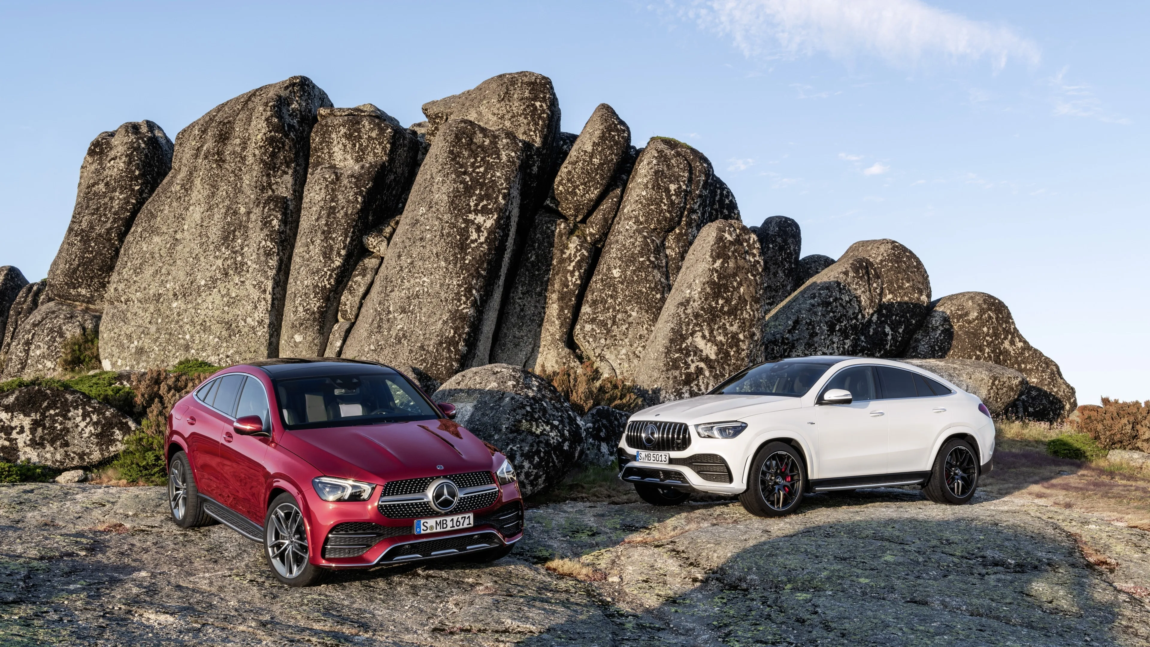 Two Mercedes SUVs Parked in Scenic Rocky Outdoor Location