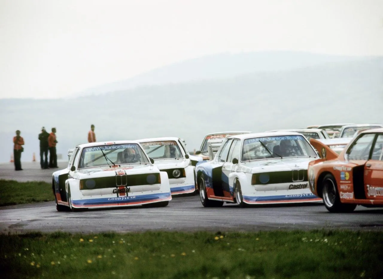 Vintage Bmw Cars Lined Up Outdoors at Car Show Event