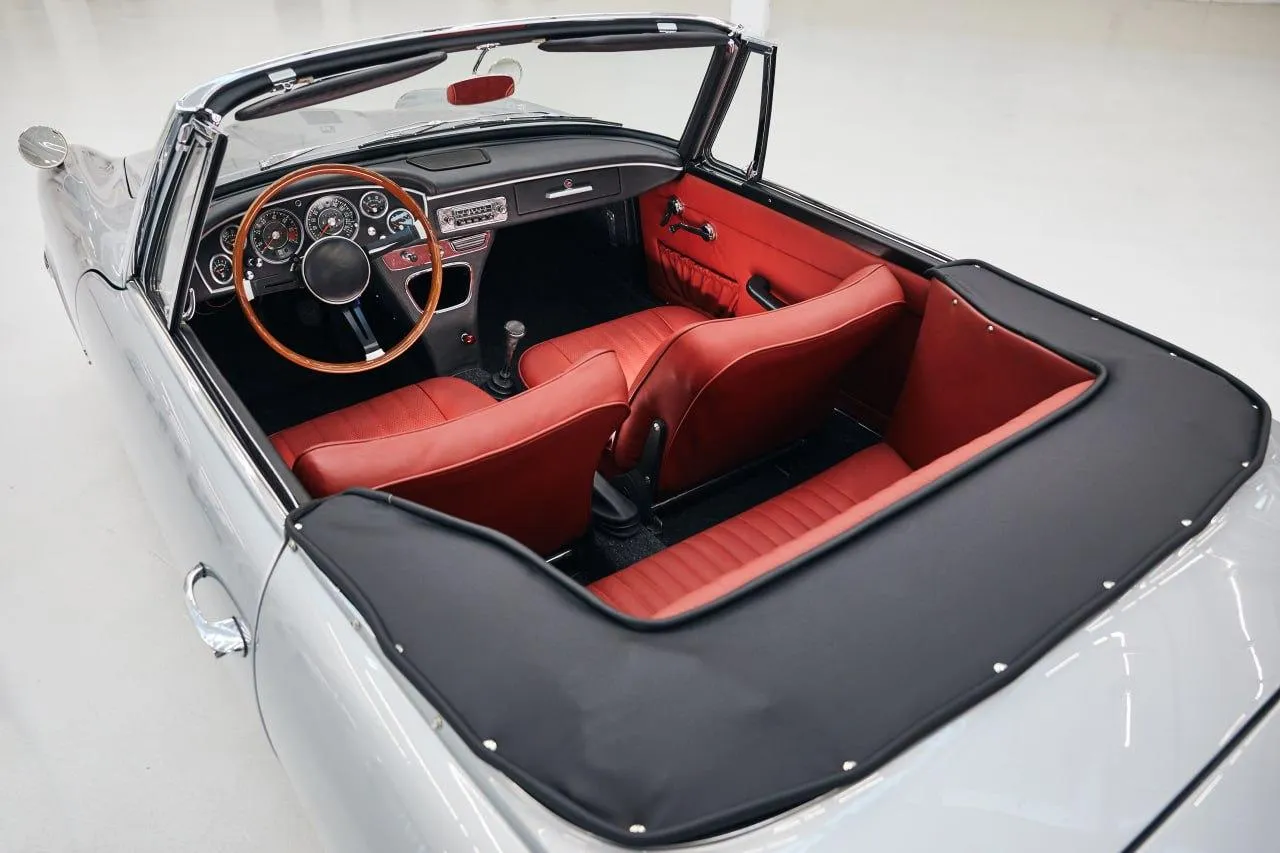 Vintage Bmw Convertible with Red Interior Seats Wallpaper
