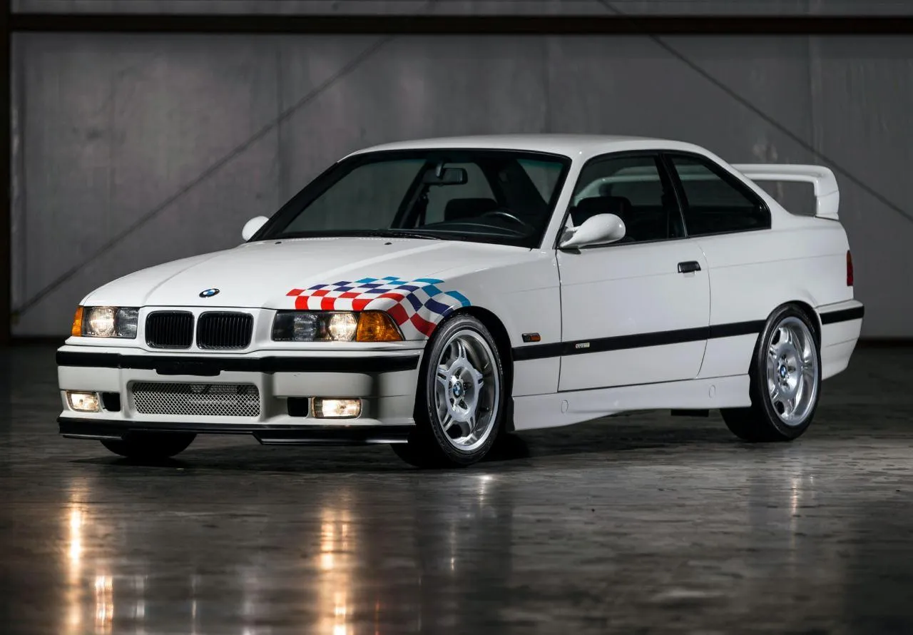 Vintage Bmw M3 E36 Parked in a Concrete Garage
