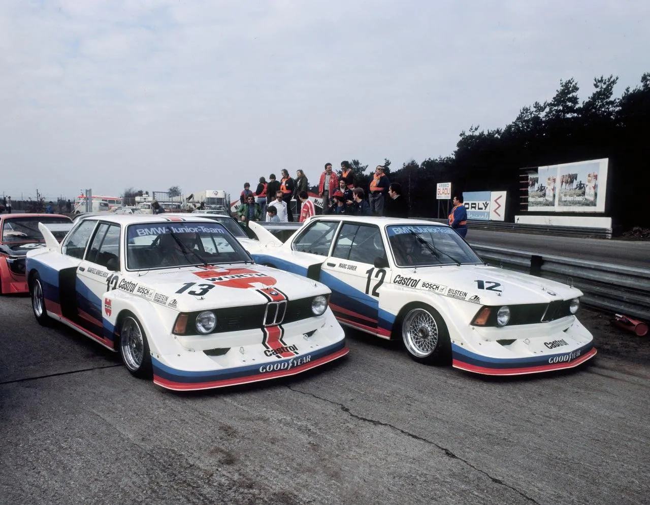 Vintage Bmw Race Cars Lined Up on a Race Track