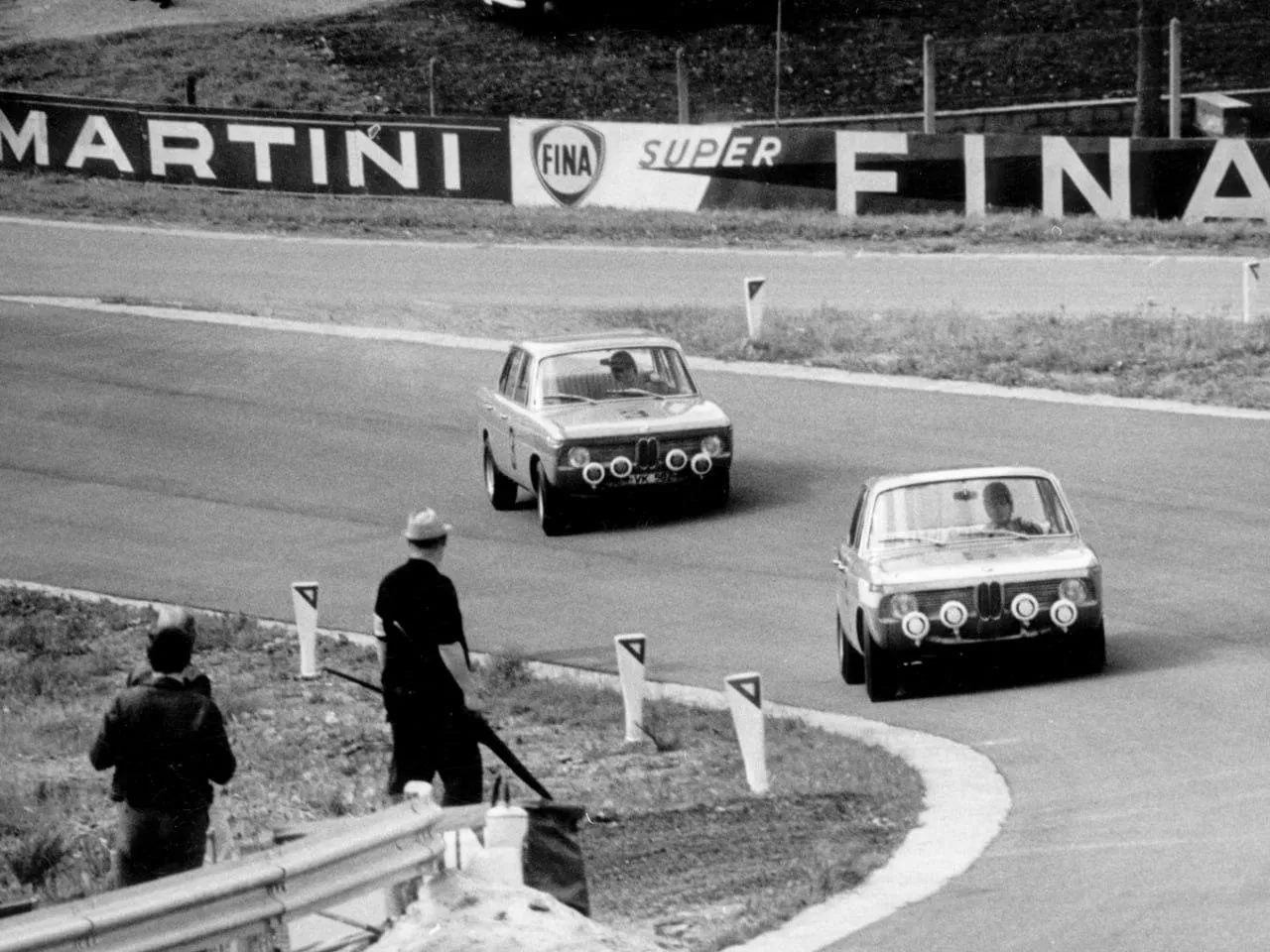 Vintage Bmw Race Cars on Track in Black and White Photo