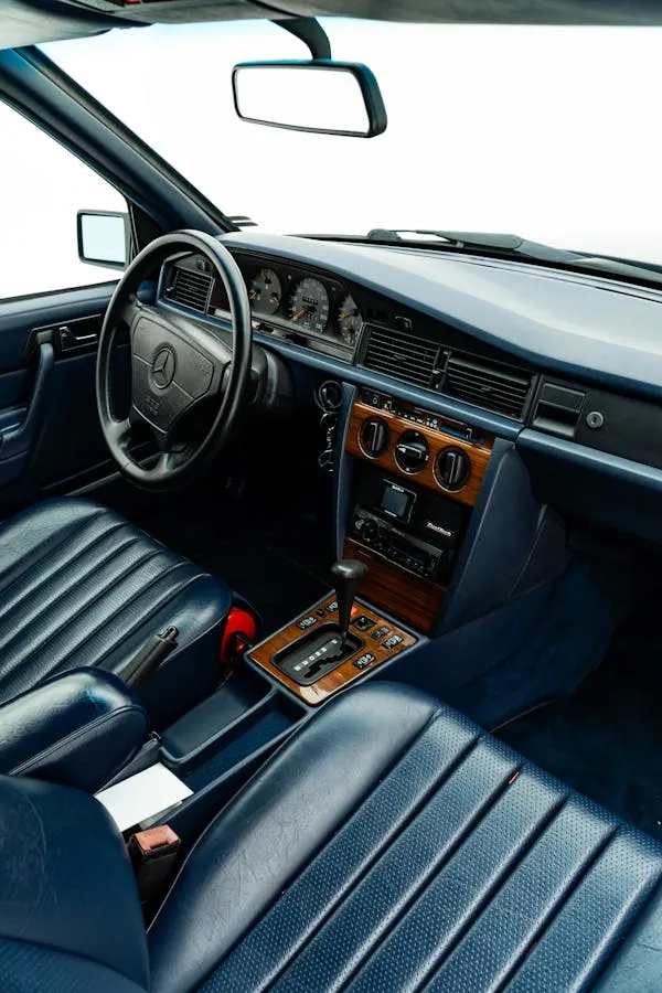 Vintage Mercedes interior with blue leather seats Wallpaper