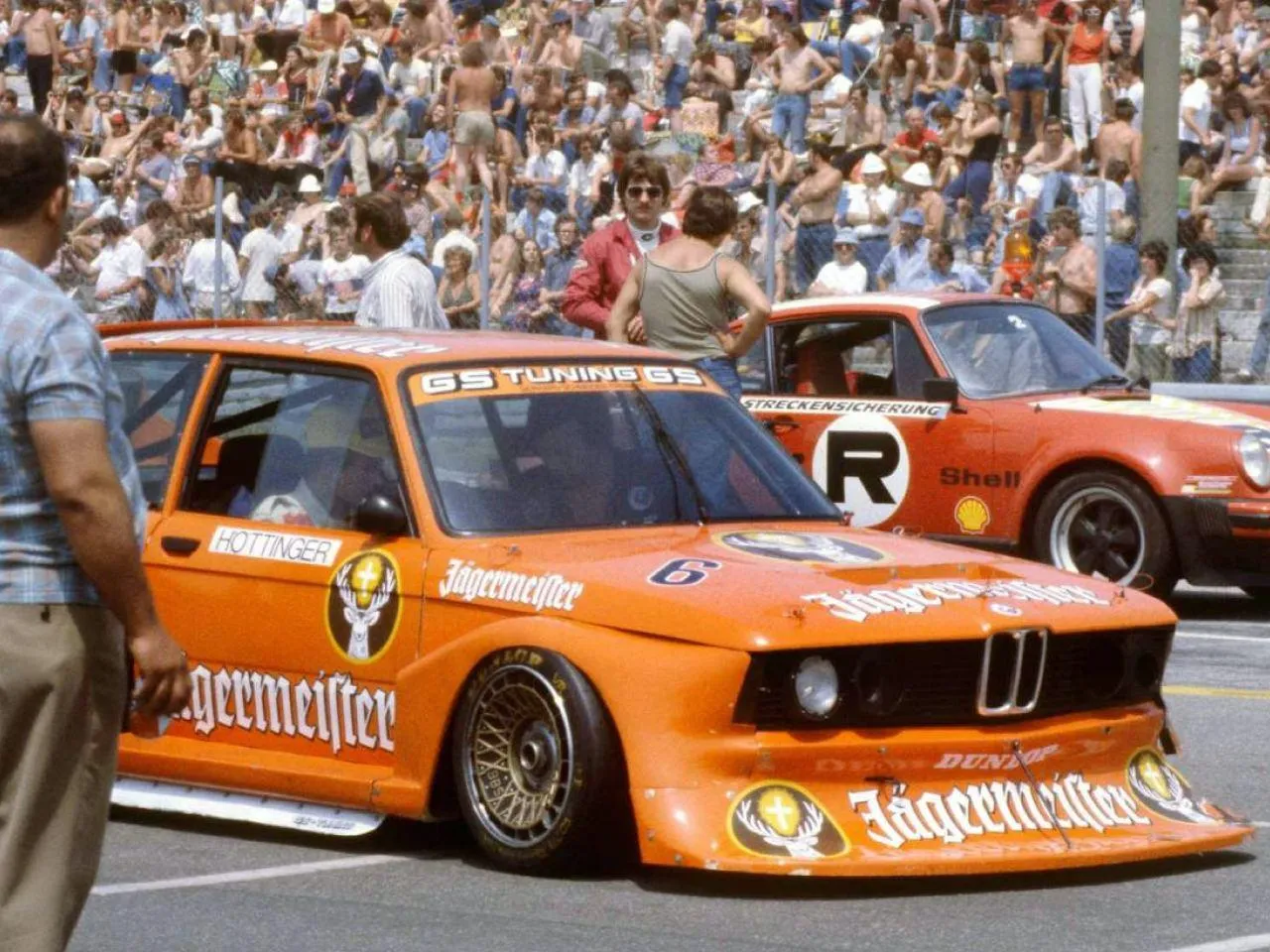 Vintage Orange Bmw Race Car at Classic Racing Event