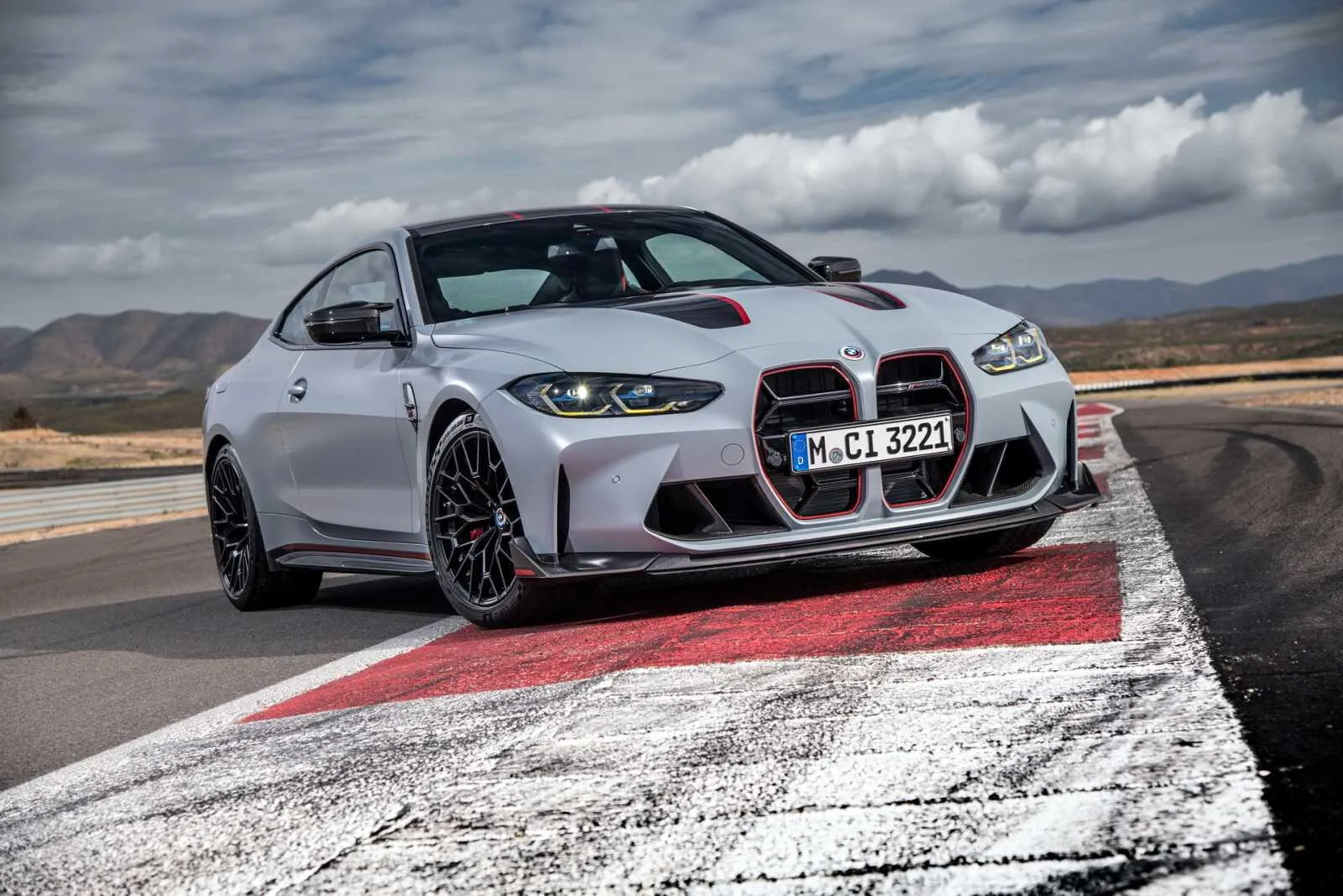 White Bmw 3 Series on the Racetrack with a Sporty Look