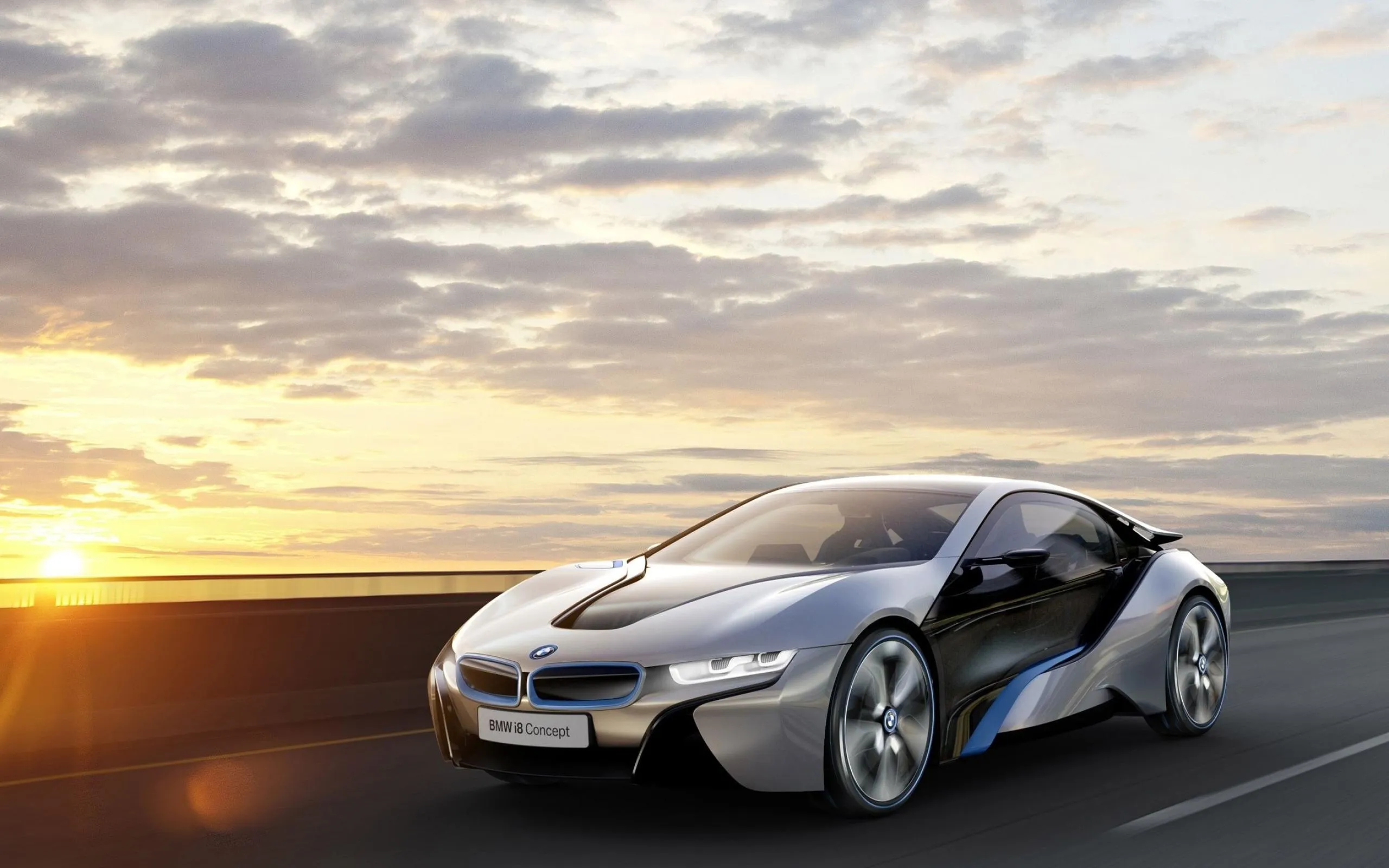 White Bmw Concept Car at Sunset on Coastal Roadside
