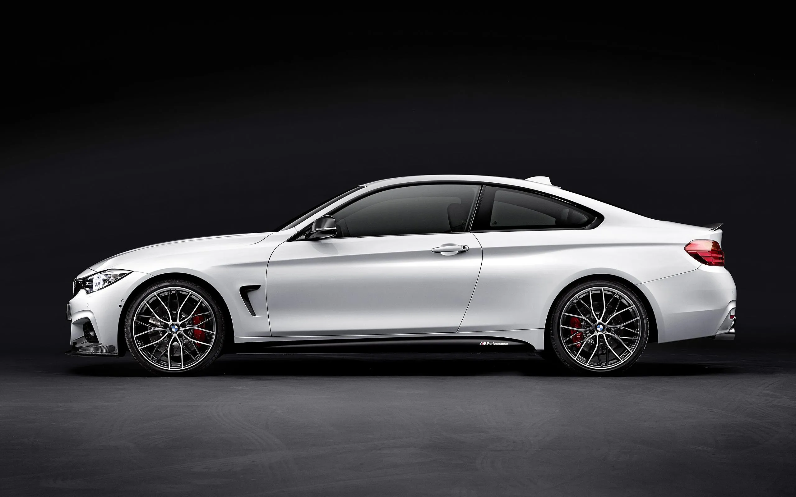 White Bmw Coupe on Black Background Side Profile View