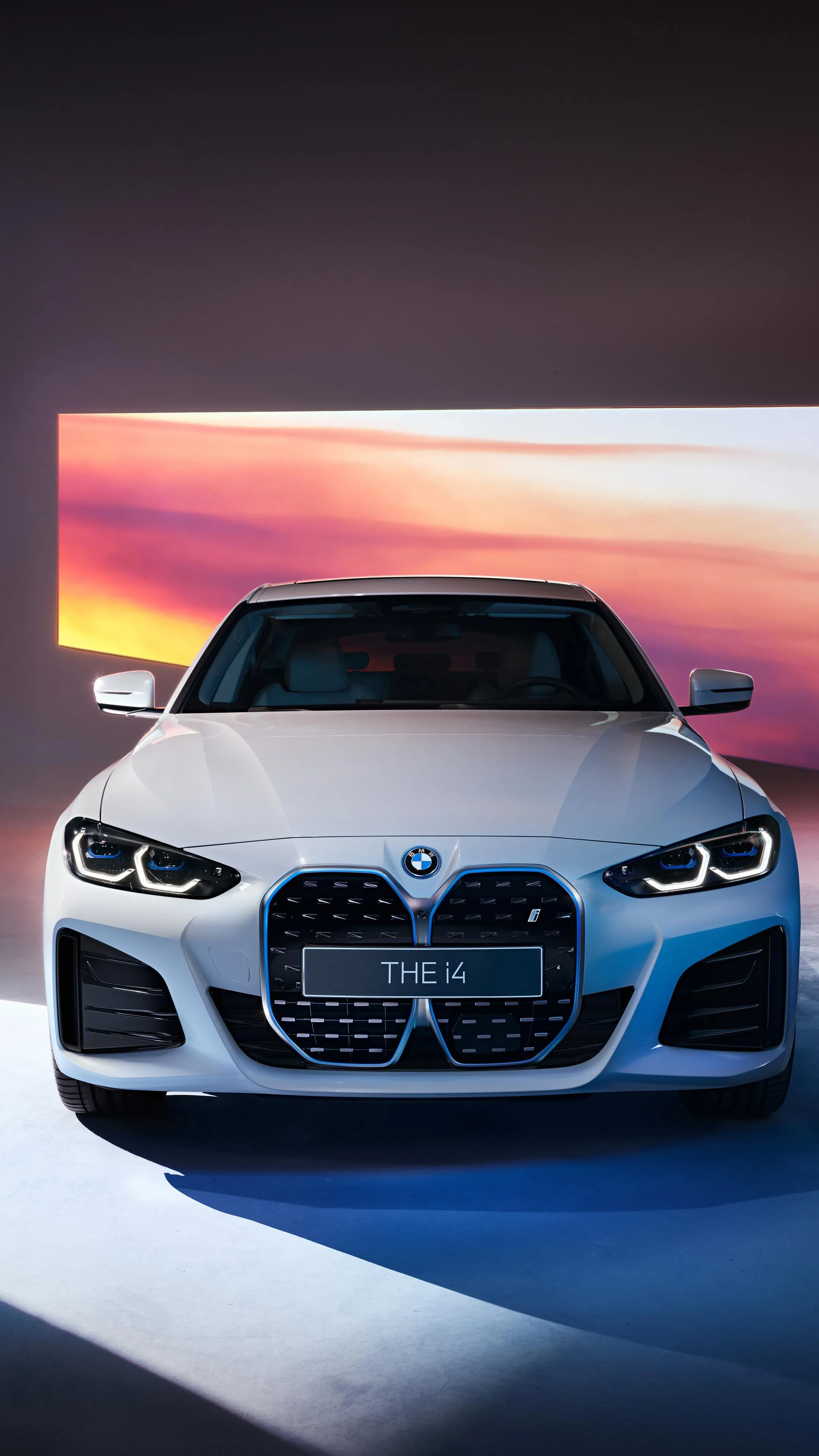 White Bmw Front View Captured in Vibrant Sunset Light