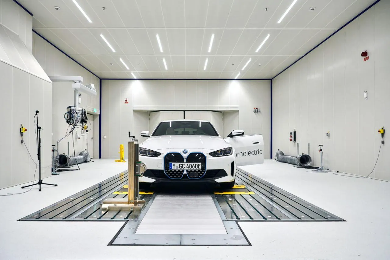 White Bmw in Clean High Tech Automotive Paint Facility