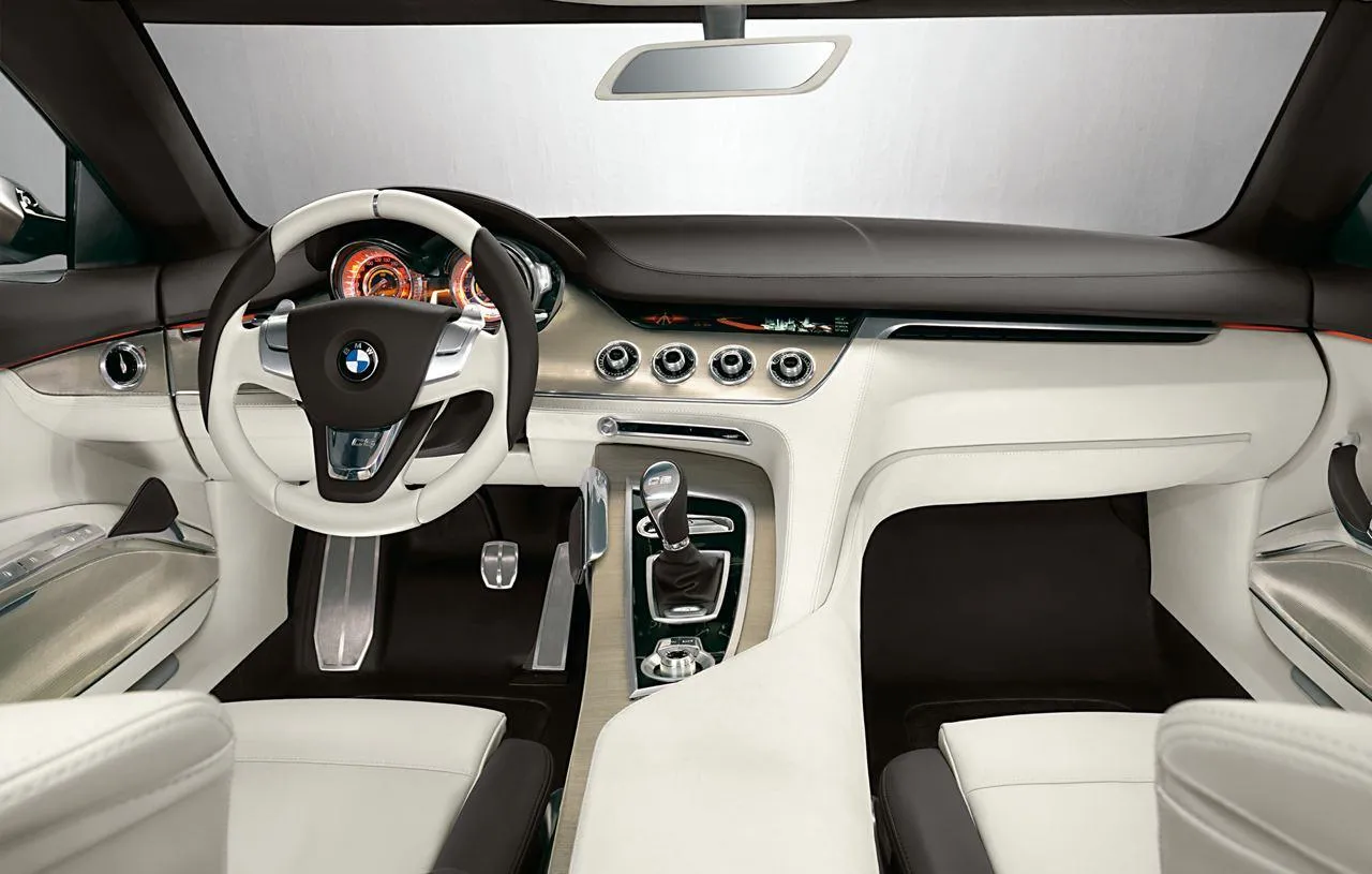White Bmw Interior Showing Dashboard and Steering Design