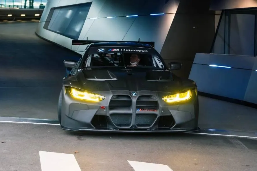 White Bmw M3 in City Parking Area Surrounded By Other Cars