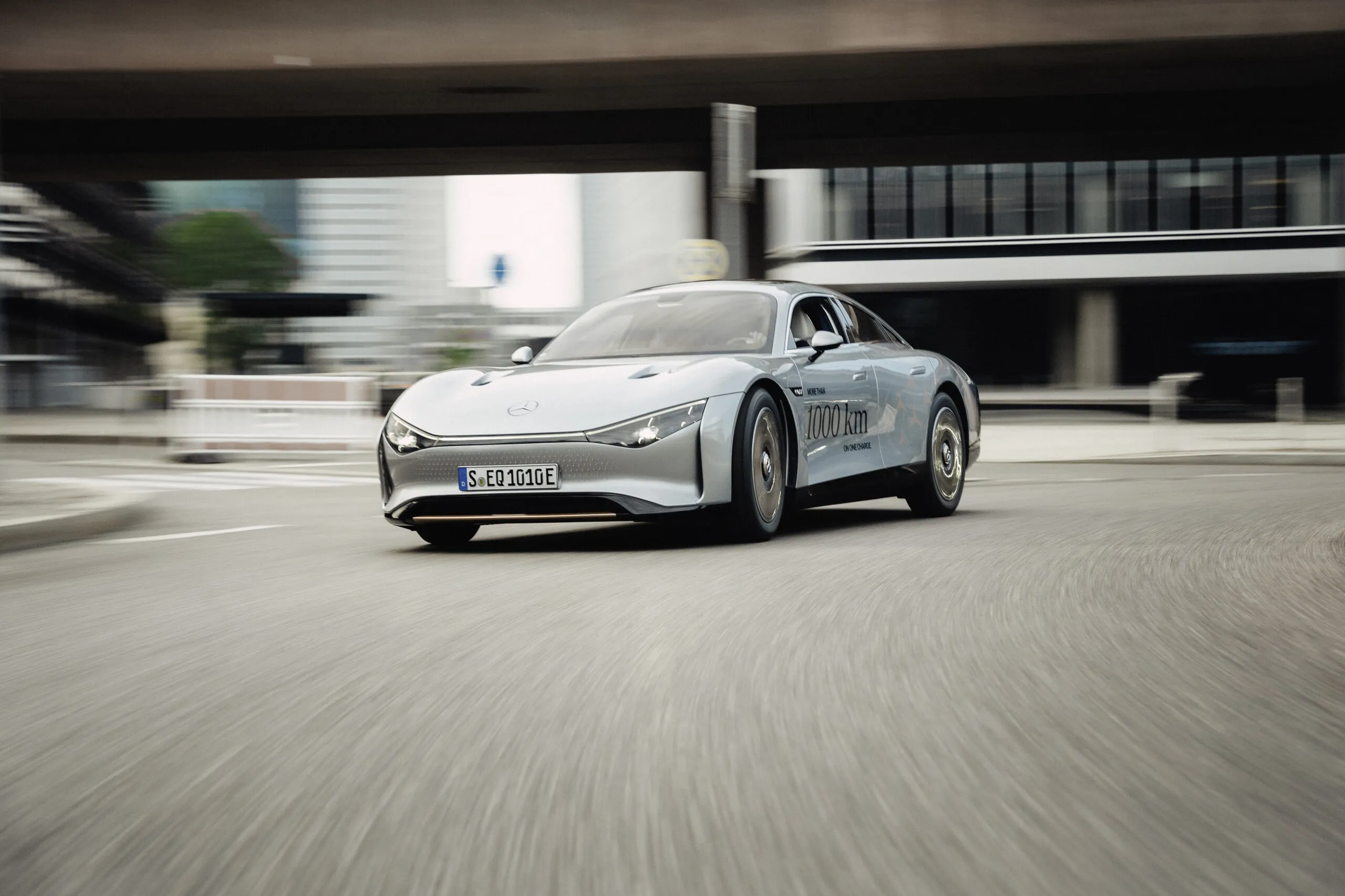 White Mercedes Benz Car Driving Fast in Urban Area Wallpaper