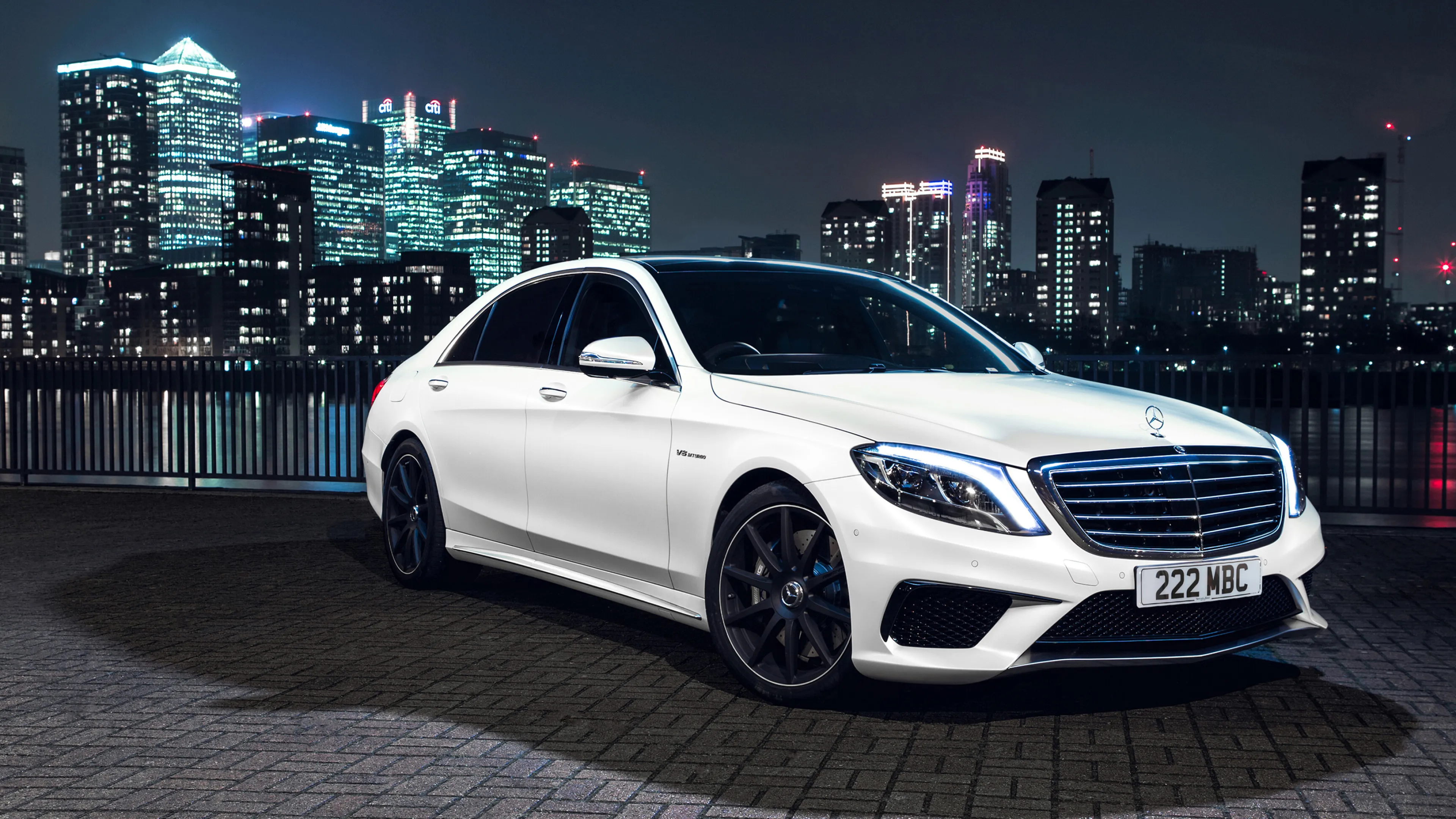 White Mercedes Benz Sedan in City Nightscape Wallpaper